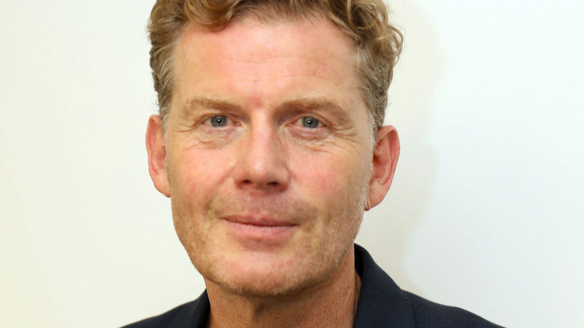 Der Regionale-2025-Agentur und Geschäftsführer Region Köln/Bonn e.V., Dr. Reimar Molitor, schaut in die Kamera.