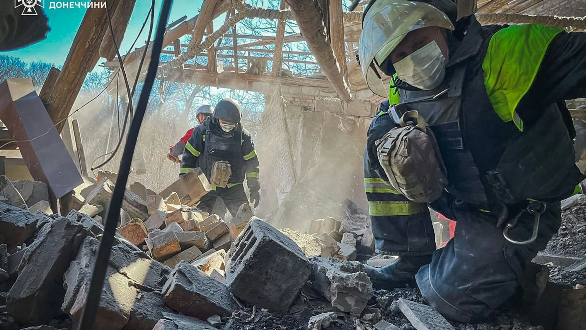 This handout photograph taken and released by Ukrainian Emergency Service on March 28, 2024, shows rescuers working at the site of a missile attack in Mykolaivka, Donetsk region, amid the Russian invasion of Ukraine. Russian aerial attacks killed three people in frontline Ukrainian regions on March 28, 2024, local officials said, while Kyiv arrested two people it claimed were collaborating with Russia's intelligence services.