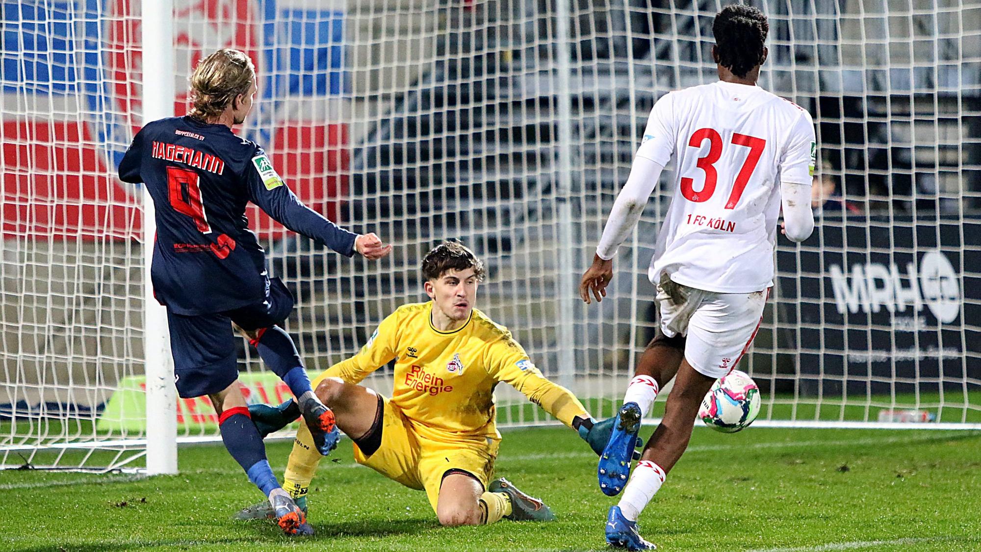 Regionalliga West: Wuppertaler SV - 1. FC Koeln II ** NUR FUeR REDAKTIONELLE ZWECKE ** EDITORIAL USE ONLY **Fussball Regionalliga West 22.Spieltag Freitag 16.02.2024 Stadion am Zoo Wuppertal Wuppertaler SV - 1. FC Koeln II Kevin Hagemann (WSV) scheitert an Jonas Nickisch (Koeln II) Deutschland Wuppertal Copyright: StefanxRittershaus *** Regionalliga West Wuppertaler SV 1 FC Koeln II FOR EDITORIAL PURPOSES ONLY p Soccer Regionalliga West 22 Matchday Friday 16 02 2024 Stadion am Zoo Wuppertal Wuppertaler SV 1 FC Koeln II Kevin Hagemann WSV fails to Jonas Nickisch Koeln II Germany Wuppertal Copyright StefanxRittershaus Copyright: StefanxRittershaus doc7u6a6h1yobrg2vz2c5y ,EDITORIAL USE ONLY