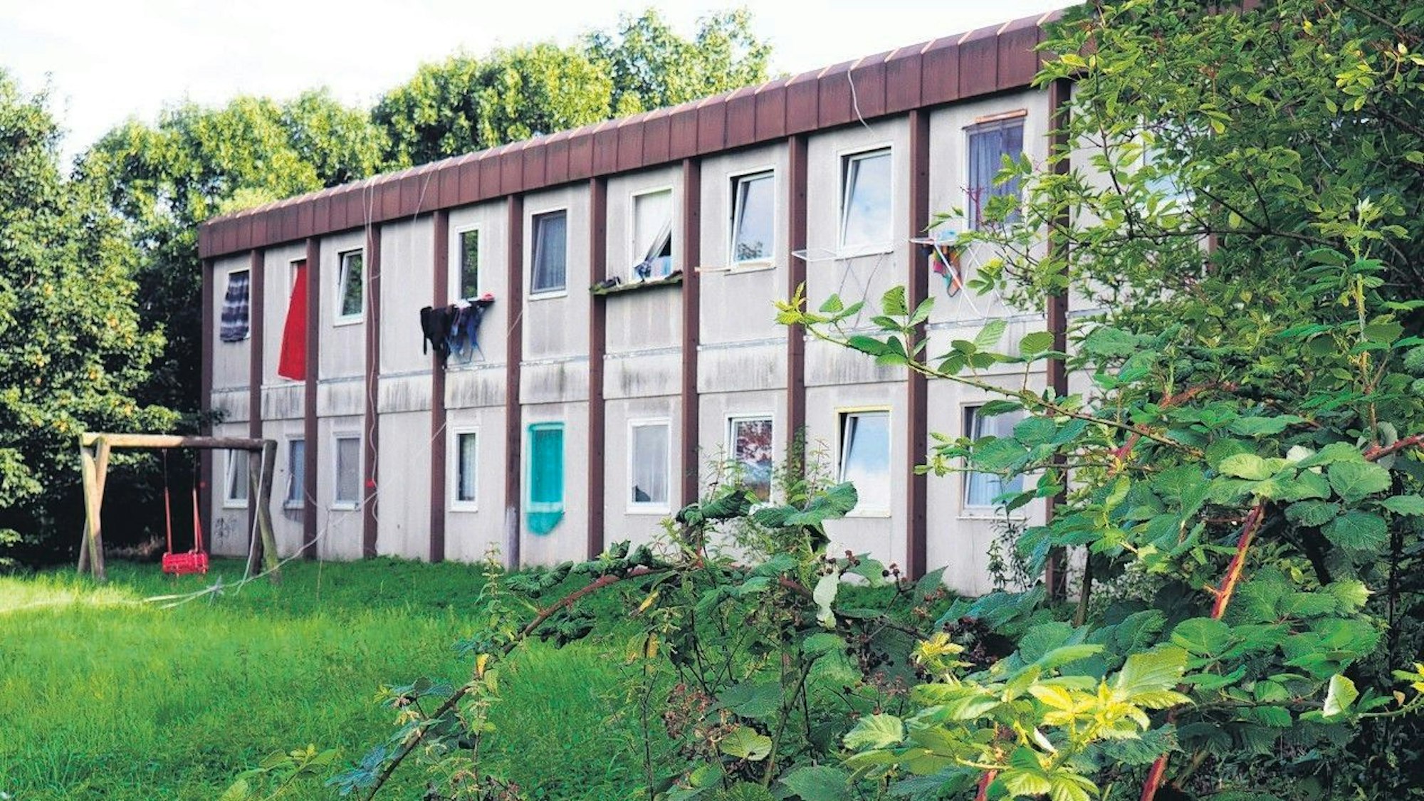 Auf dem Bild ist eine Flüchtlingsunterkunft zu sehen.