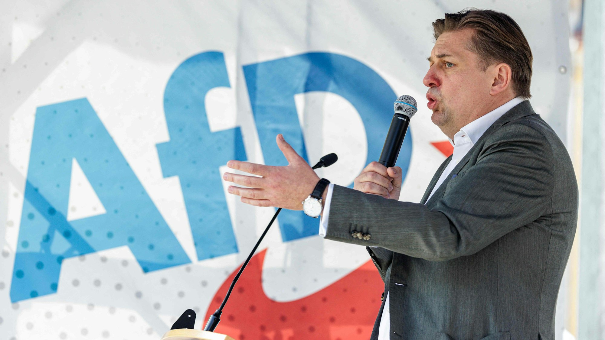 Top candidate of German right-wing Alternative for Germany (AfD) party for the European election Maximilian Krah speaks during a campaign event for the upcoming European elections in Dresden, eastern Germany on May 1, 2024. Maximilian Krah, who is the AfD's top candidate for June's EU elections, is at the centre of a deepening crisis after one of his aides in the European Parliament was arrested on suspicion of spying for China. German prosecutors have also launched a preliminary investigation against Krah himself over reports of suspicious payments received from China and Russia. (Photo by JENS SCHLUETER / AFP)