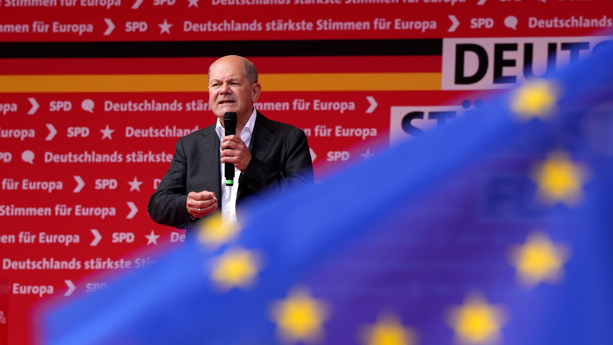 German Chancellor Olaf Scholz speaks during the closing rally campaign for the European Parliament election of the German Social Democrats (SPD) in Duisburg, Germany, Saturday, June 8, 2024. (AP Photo/Martin Meissner)