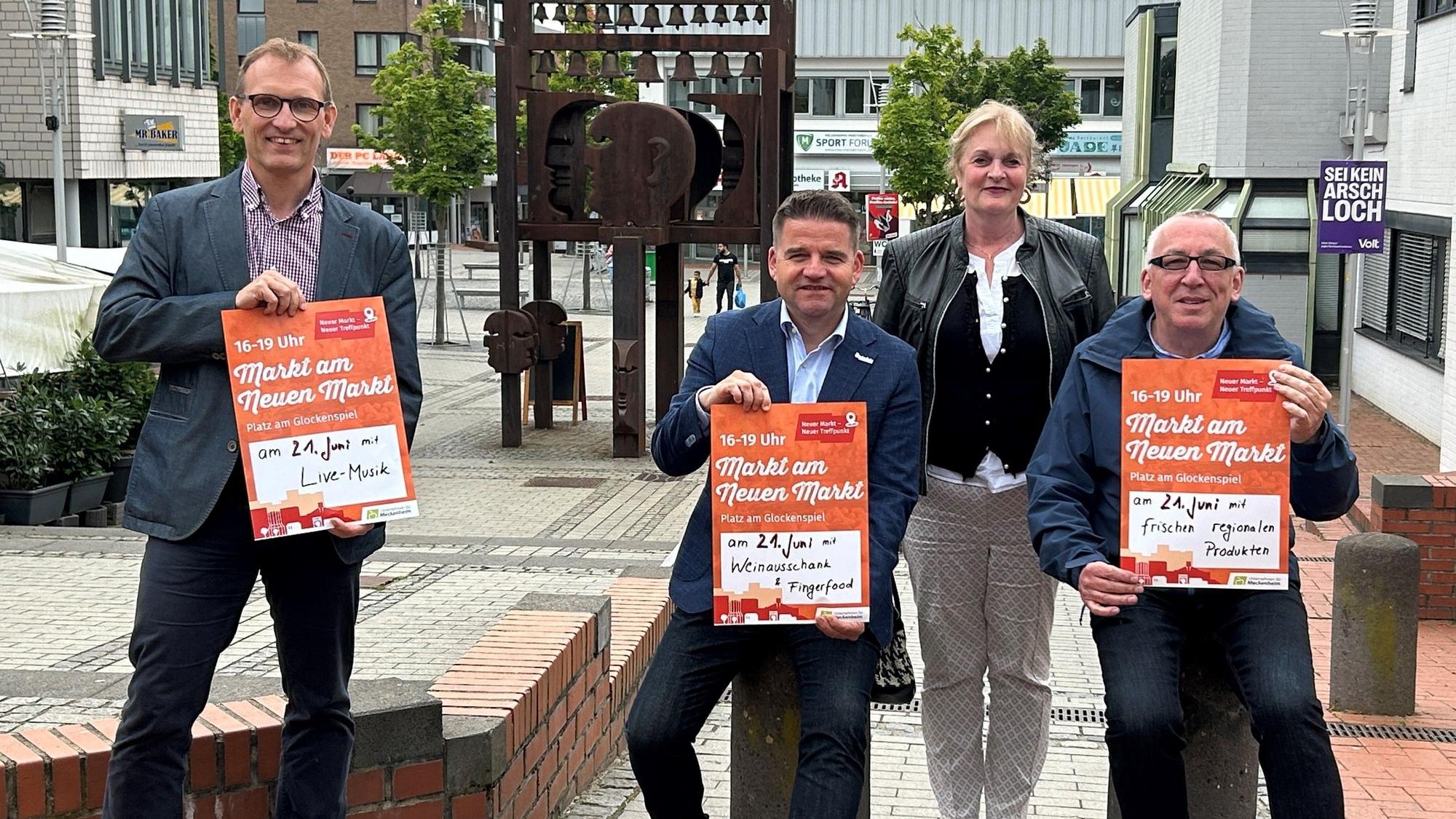 Freuen sich auf den neuen Treffpunkt beim „Markt am Neuen Markt“, von links: Wirtschaftsförderer Dirk Schwindenhammer, Bürgermeister Holger Jung sowie Gabriele Sperling und Willi M. Wittges-Stoelben vom Meckenheimer Verbund.