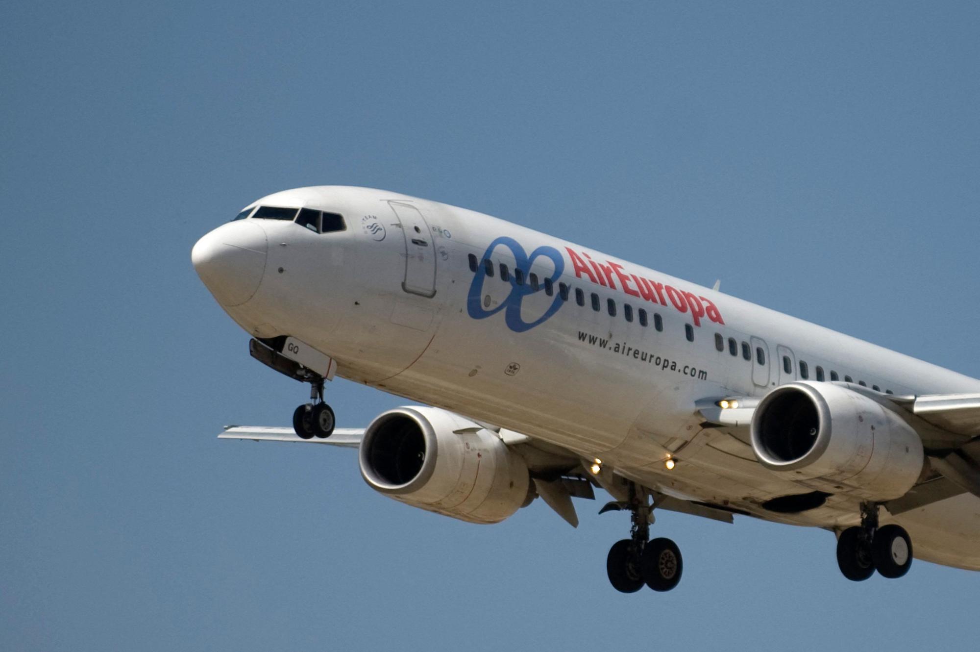 (FILES) An Air Europa plane takes off from Malaga's airport on September 22, 2011 in Malaga, on the first day of a strike by Air Europa pilots that will continue every Monday and Thursday indefinitely, pilots union Sepla said. An Air Europa Boeing 787-9 Dreamliner made an emergency landing in Brazil on July 1, 2024, after several people were injured in "strong turbulence" on a flight from Madrid to Montevideo, the airline said. Flight UX045 was diverted to the airport of Natal in northeastern Brazil on its way to the Uruguayan capital, the Spanish company said on X, adding that passengers who suffered injuries "are receiving attention." (Photo by Jorge Guerrero / AFP)