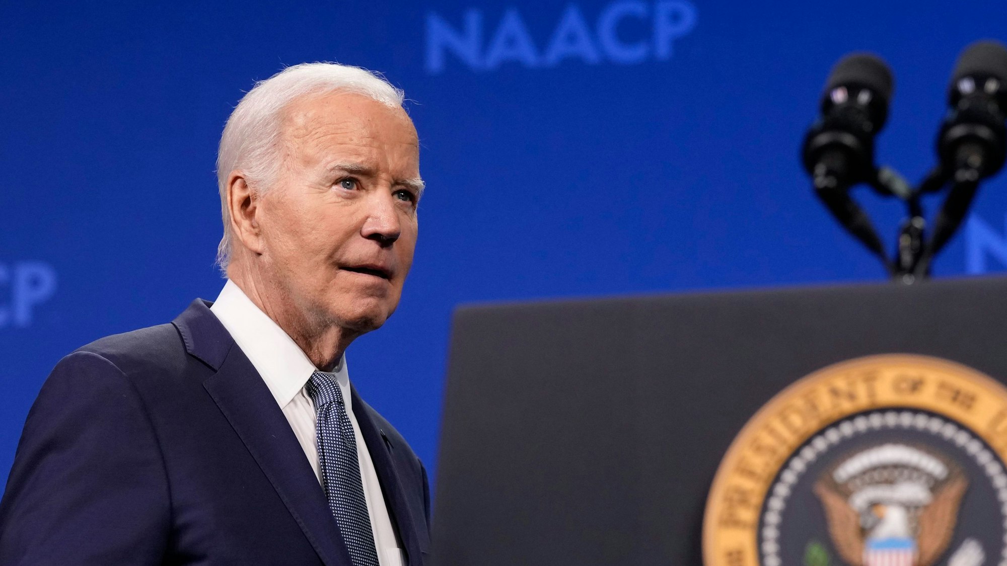 President Joe Biden takes the stage to speak at the 115th NAACP National Convention in Las Vegas, Tuesday, July 16, 2024. Biden tested positive for COVID-19 on Wednesday. (AP Photo/Susan Walsh)