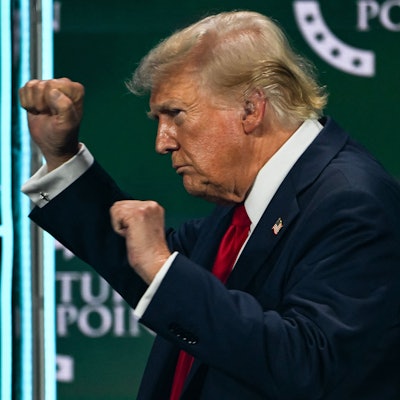 Former US President and 2024 Republican presidential candidate Donald Trump gestures after speaking at Turning Point Action's "The Believers Summit" in West Palm Beach, Florida, on July 26, 2024. (Photo by CHANDAN KHANNA / AFP)