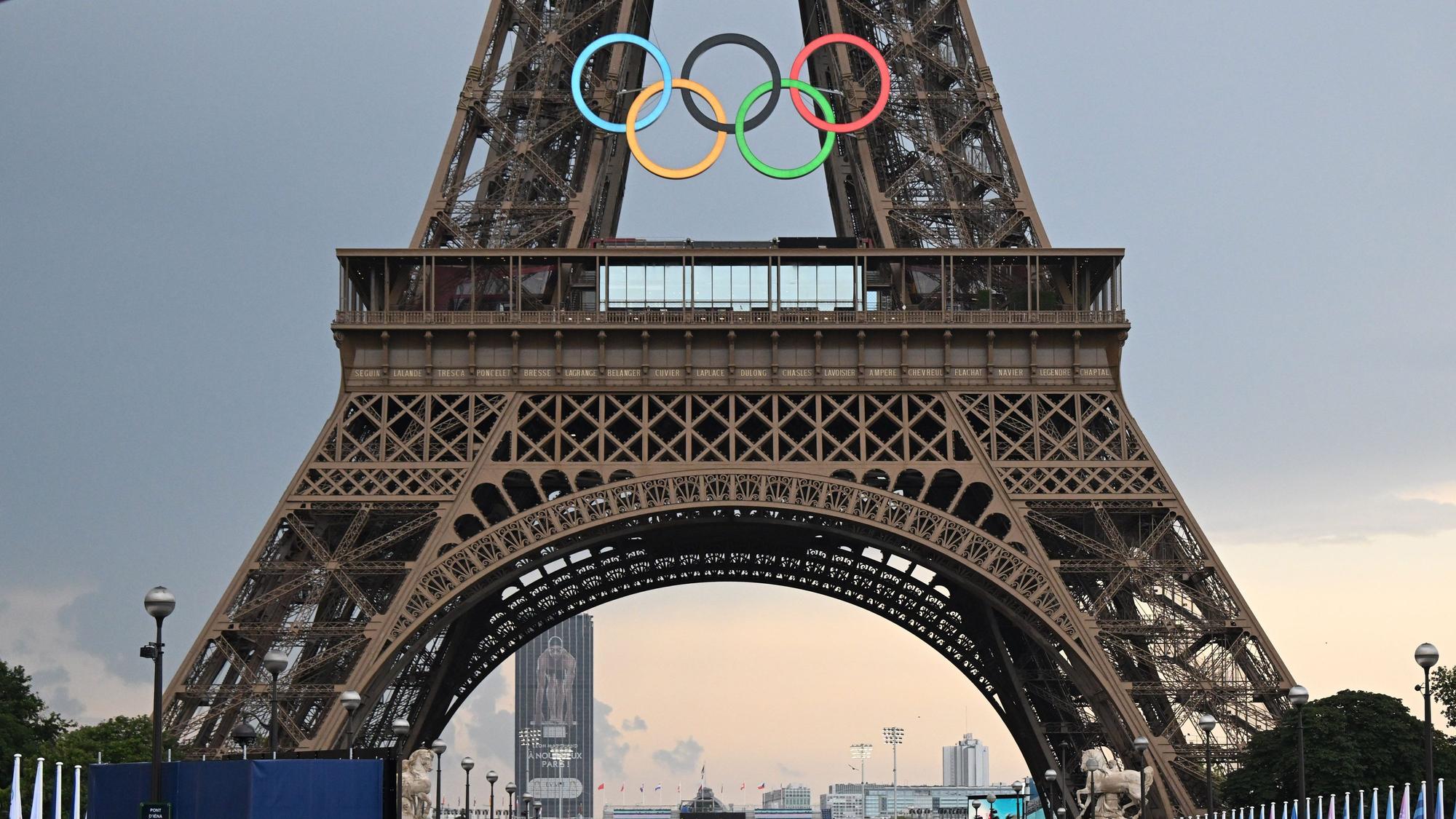 Olympische Ringe am Eiffelturm: Millionen Sportfans reisen nach Paris, doch nicht alle Betriebe profitieren