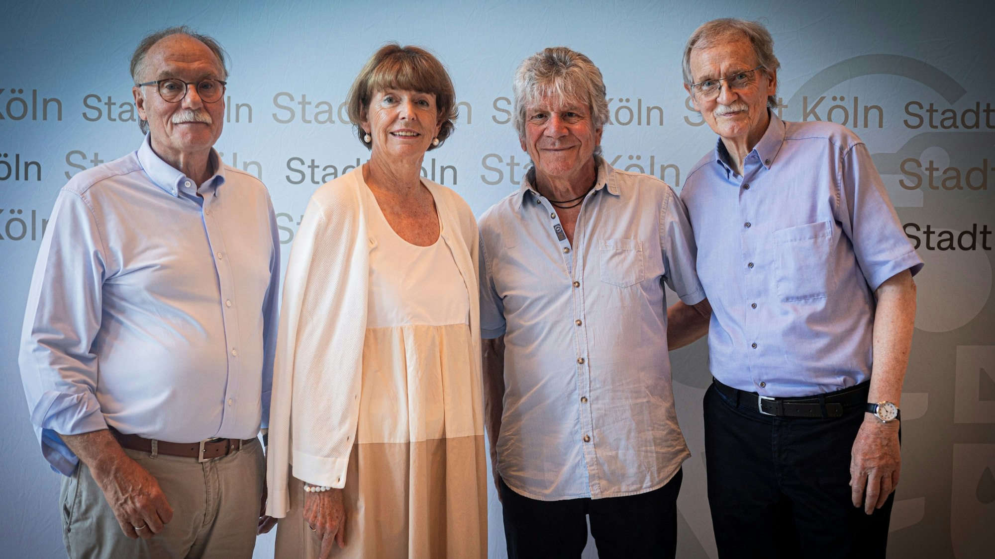 Bernhard Conin, Henriette Reker, Bömmel Lückerath und Wolfgang Oelsner im Rathaus.