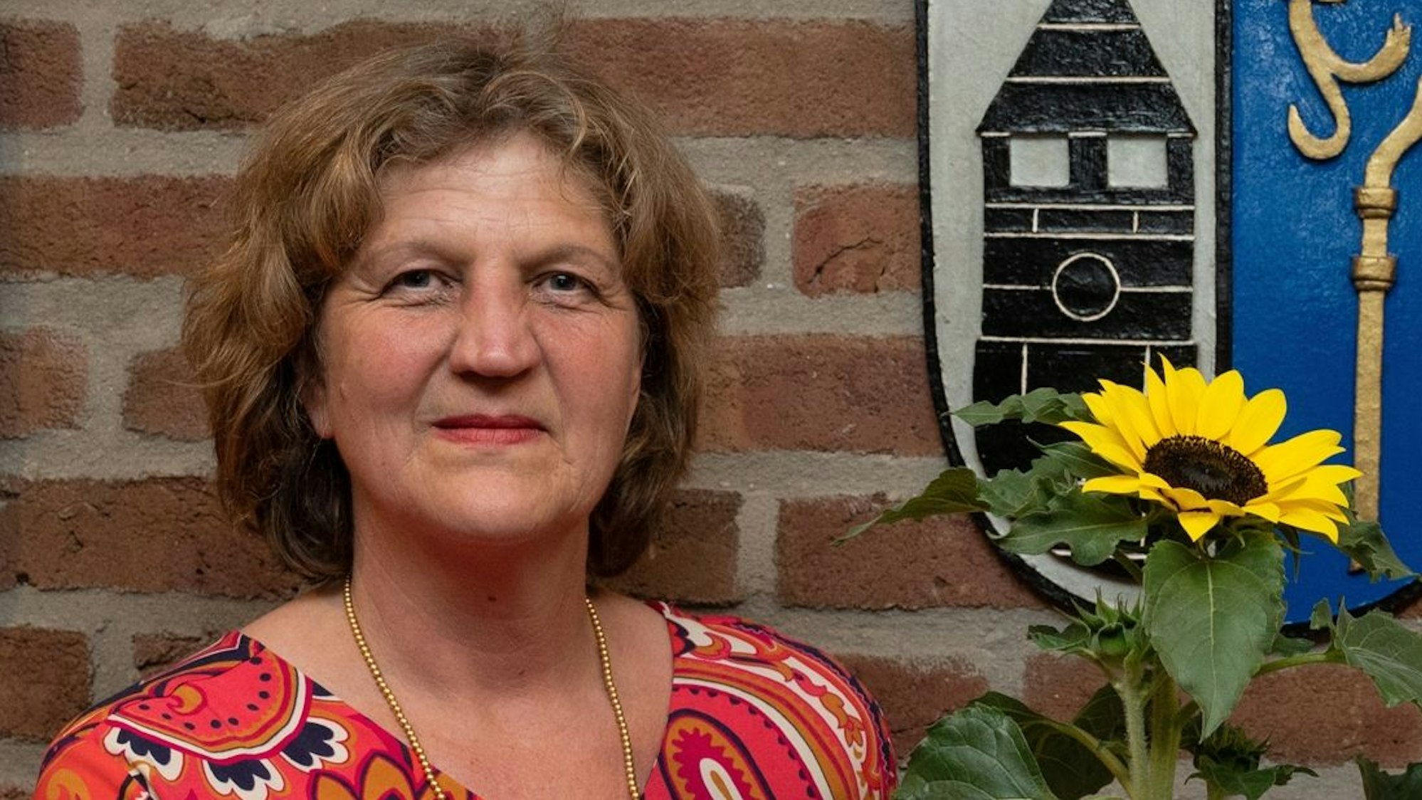 Das Bild zeigt die Bürgermeisterkandidatin der Partei Bündnis 90/Die Grünen in Pulheim.