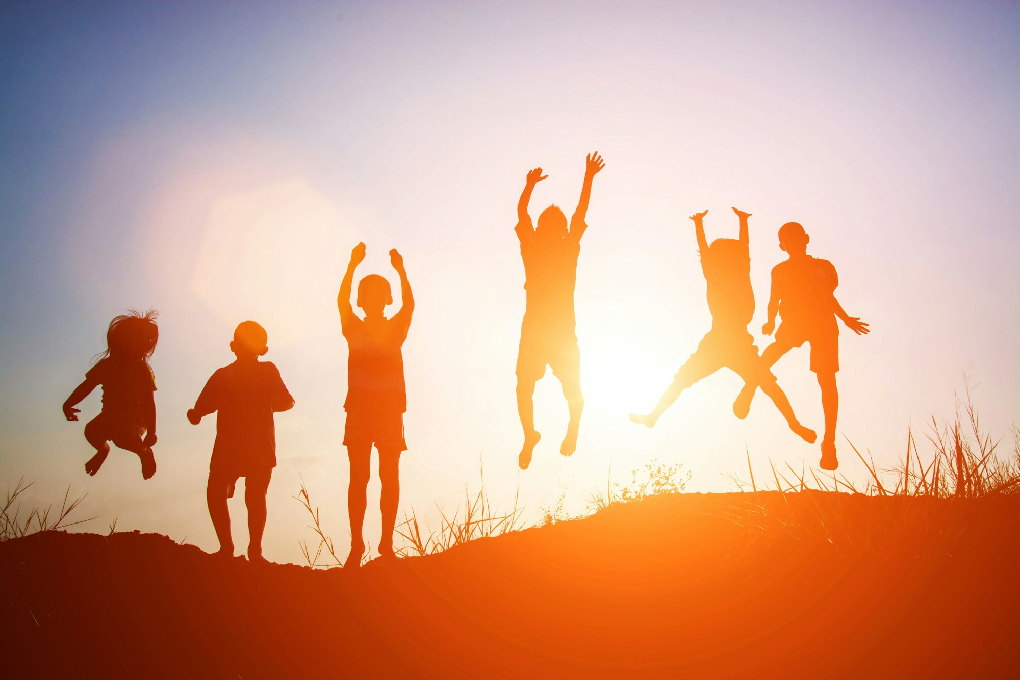 Silhouette of children jump gladness happy time.