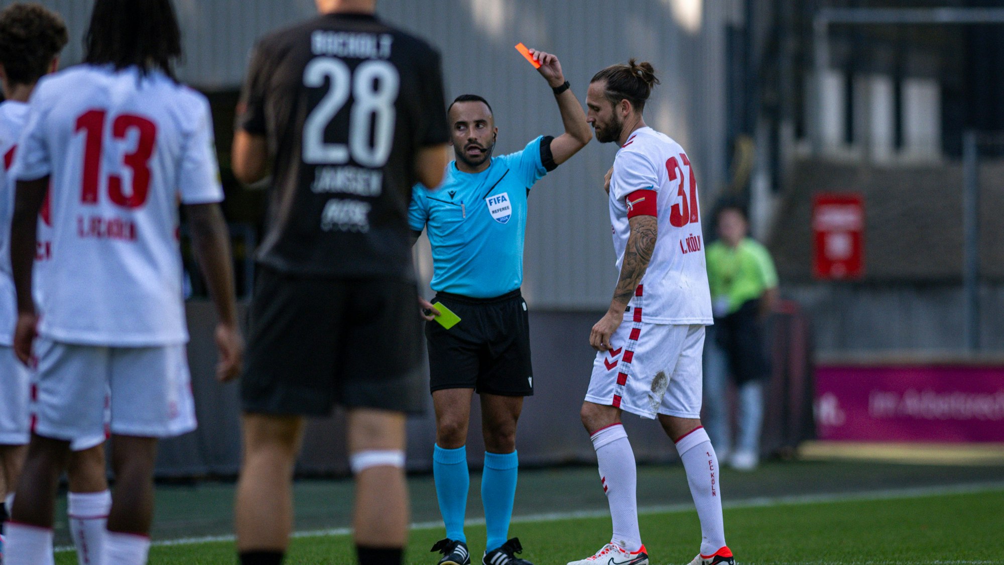 Fussball, Saison 2024/2025, Regionalliga West, 21.09.2024, 08. Spieltag, Herren, 1.FC Koeln U23 weiss vs. 1.FC Bocholt schwarz /// v.l.: Jasmin Sabotic Schiedsrichter, Marco Hoeger 1. FC Koeln U23, Koeln Franz-Kremer-Stadion Nordrhein-Westfalen Deutschland *** Football, Season 2024 2025, Regionalliga West, 21 09 2024, Matchday 08, Men, 1 FC Koeln U23 white vs 1 FC Bocholt black v l Jasmin Sabotic Referee , Marco Hoeger 1 FC Koeln U23 , Koeln Franz Kremer Stadion Nordrhein Westfalen Germany 240921_fb_1fc-koeln-u23_1fc-bocholt_33310