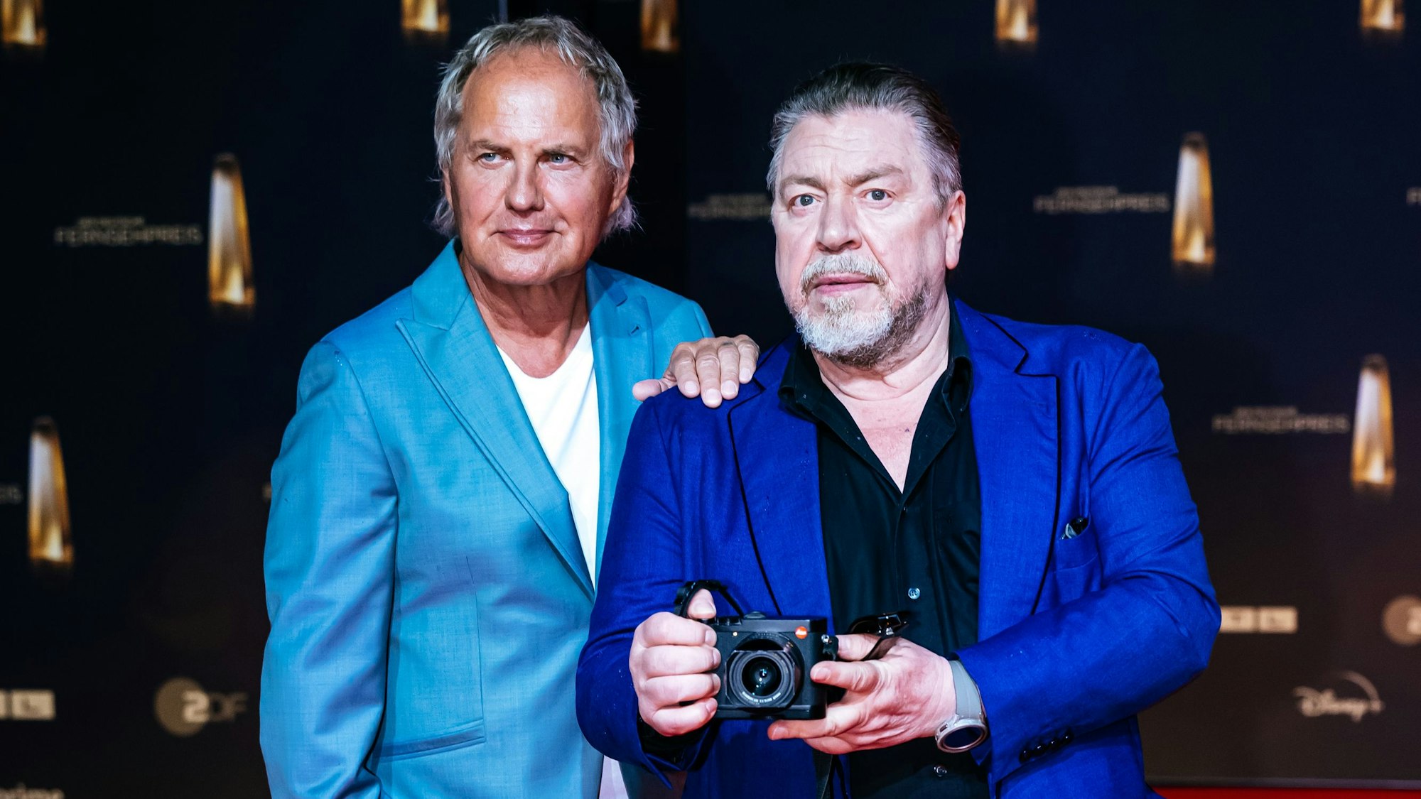 Uwe Ochsenknecht und Armin Rohde wurden kurzerhand selbst zu Fotografen.