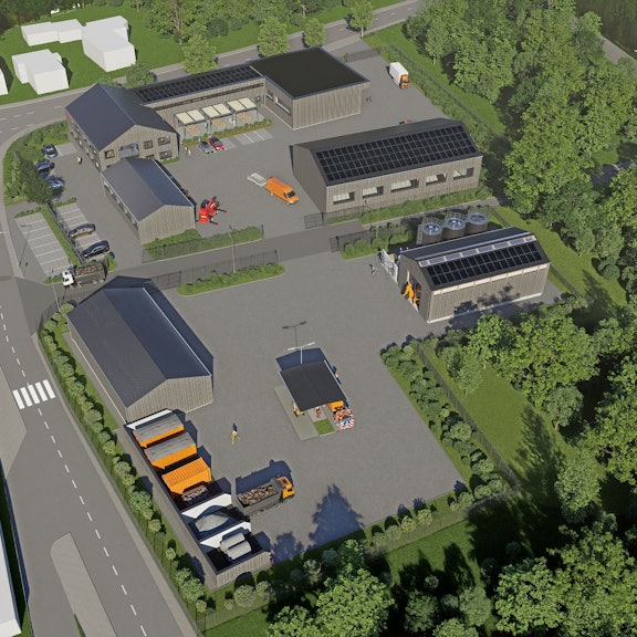 Eine Visualisierung zeigt aus der Vogelperspektive ein mit mehreren Gebäuden und Hallen bebautes Areal mit Innenhöfen, Parkplätzen und Fahrzeugen.