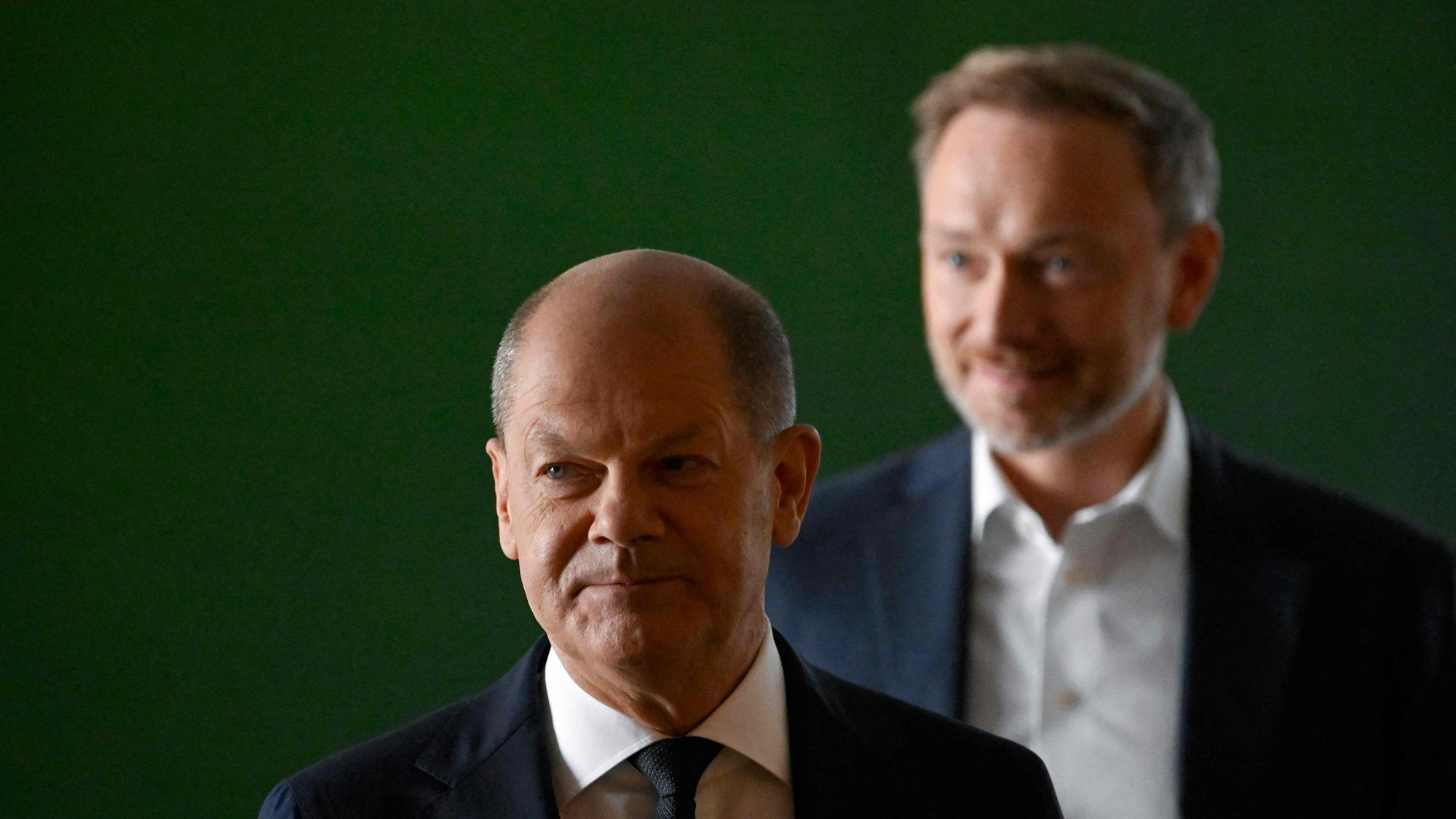 (FILES) German Chancellor Olaf Scholz (L) and German Finance Minister and Free Democrats Party (FDP) leader Christian Lindner arrive to address a press conference on the government's relief plan to cope with soaring energy costs, on September 4, 2022 at the Chancellery in Berlin. Germany's Chancellor Olaf Scholz fired his rebellious finance minister Christian Lindner on November 6, 2024. (Photo by Tobias SCHWARZ / AFP)