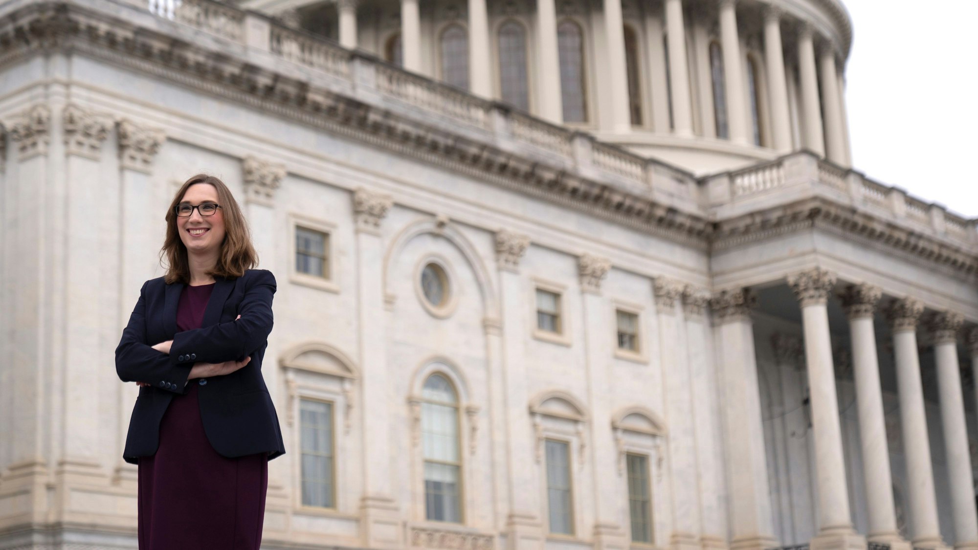 Rep.-elect Sarah McBride, D-Del., poses for a photo as she stands on the Capitol steps, in Washington, Friday, Nov. 15, 2024. (AP Photo/Mark Schiefelbein)