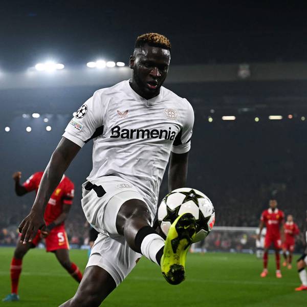 TOPSHOT - Bayer Leverkusen's Nigerian forward #22 Victor Boniface controls the ball during the UEFA Champions League football match between Liverpool and Bayer Leverkusen at Anfield stadium, in Liverpool, north west England, on November 5, 2024. (Photo by Paul ELLIS / AFP)