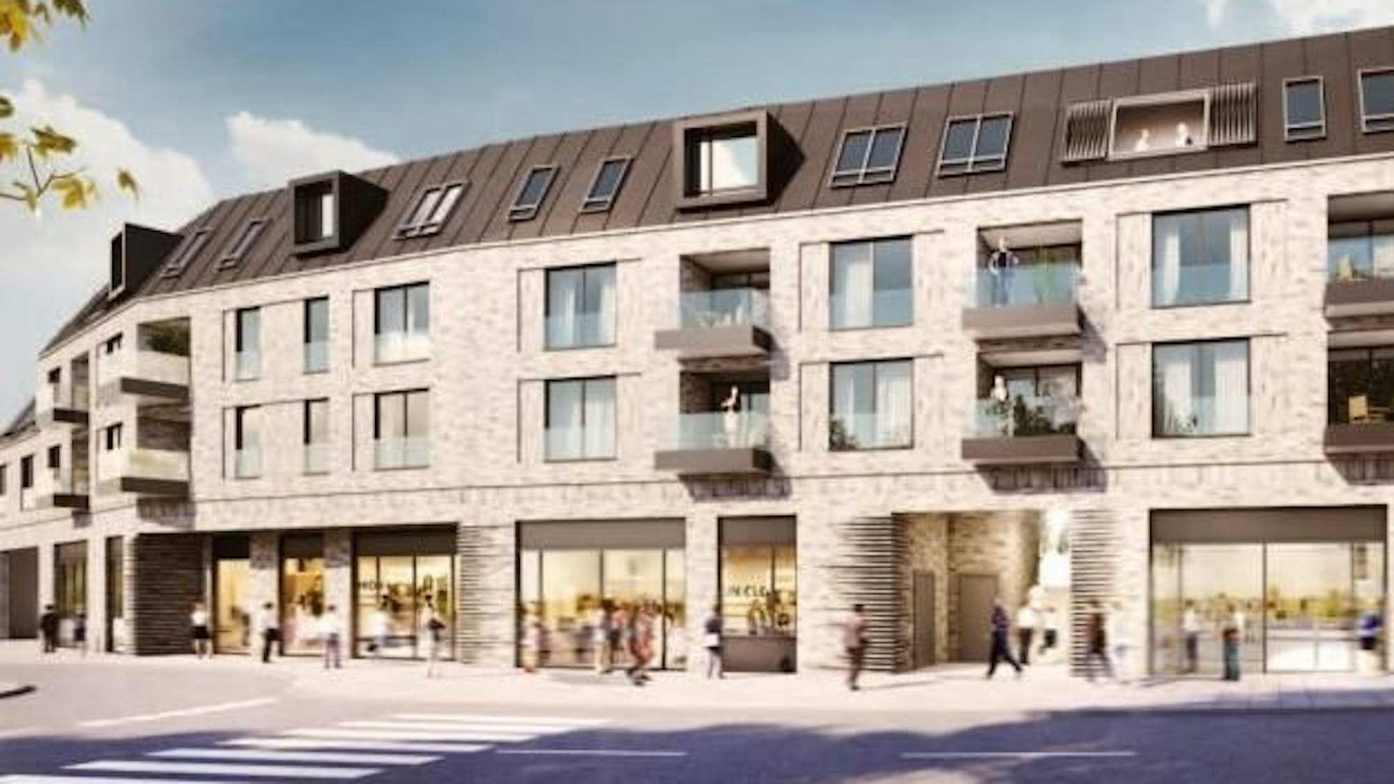 Ein Gebäude mit Geschäften im Erdgeschoss und Wohnungen in den oberen Etagen.