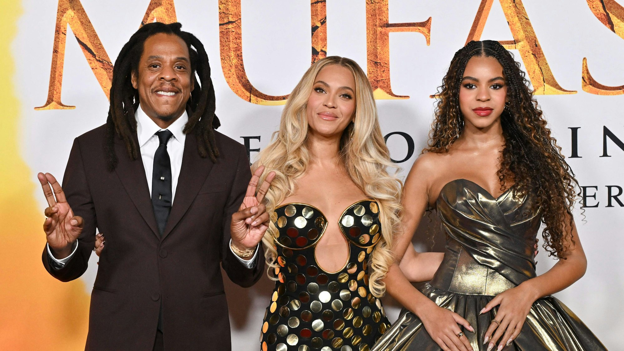 TOPSHOT - US rapper Jay-Z, singer-songwriter Beyonce and their daughter Blue Ivy Carter attend the world premiere of Disney's "Mufasa: The Lion King" at the Dolby theater in Hollywood, California, December 9, 2024. (Photo by Lisa O'CONNOR / AFP)