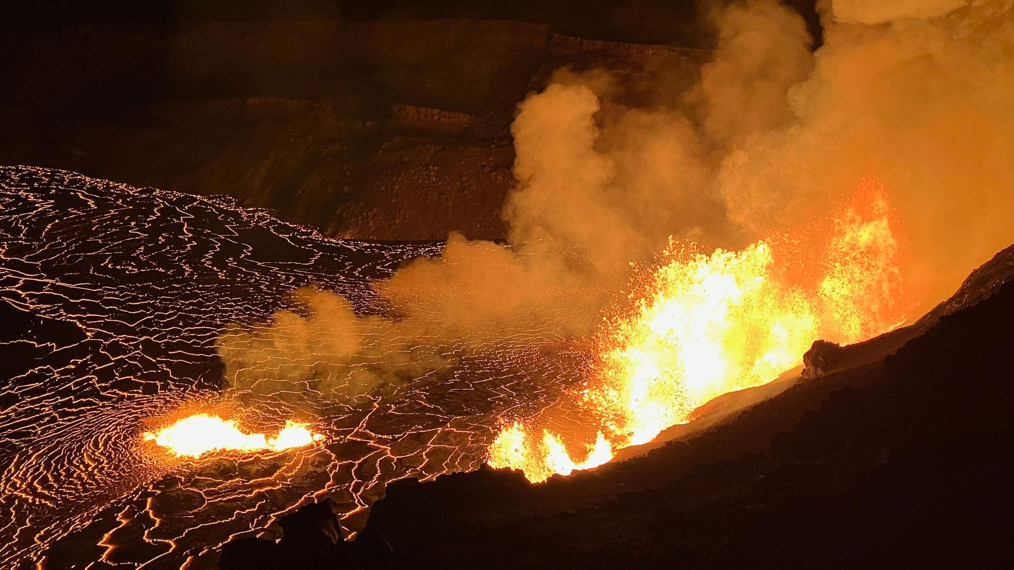 In this photo provided by the U.S. Geological Survey, an eruption takes place on the summit of the Kilauea volcano in Hawaii, Monday, Dec. 23, 2024. (N. Deligne/U.S. Geological Survey via AP)