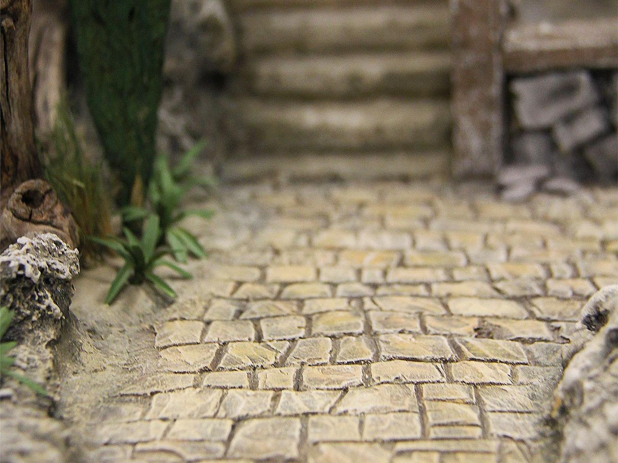 In den Krippendarstellungen wird auf jedes Detail geachtet. Dieser Pflasterstein-Weg ist handgefertigt und sieht täuschend echt aus.