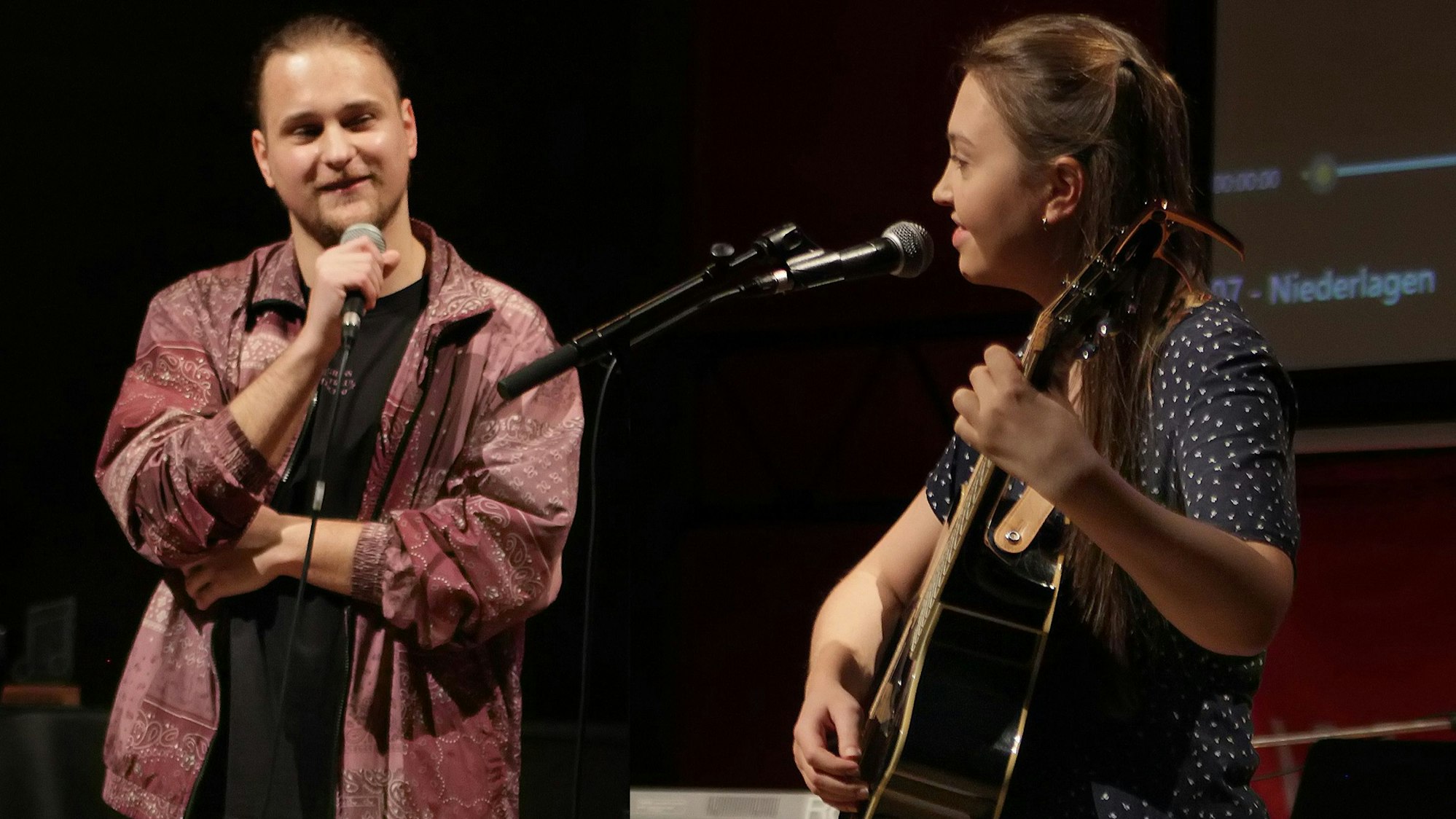 Eine Gitarristin und ein Sänger bei ihrem Auftritt.