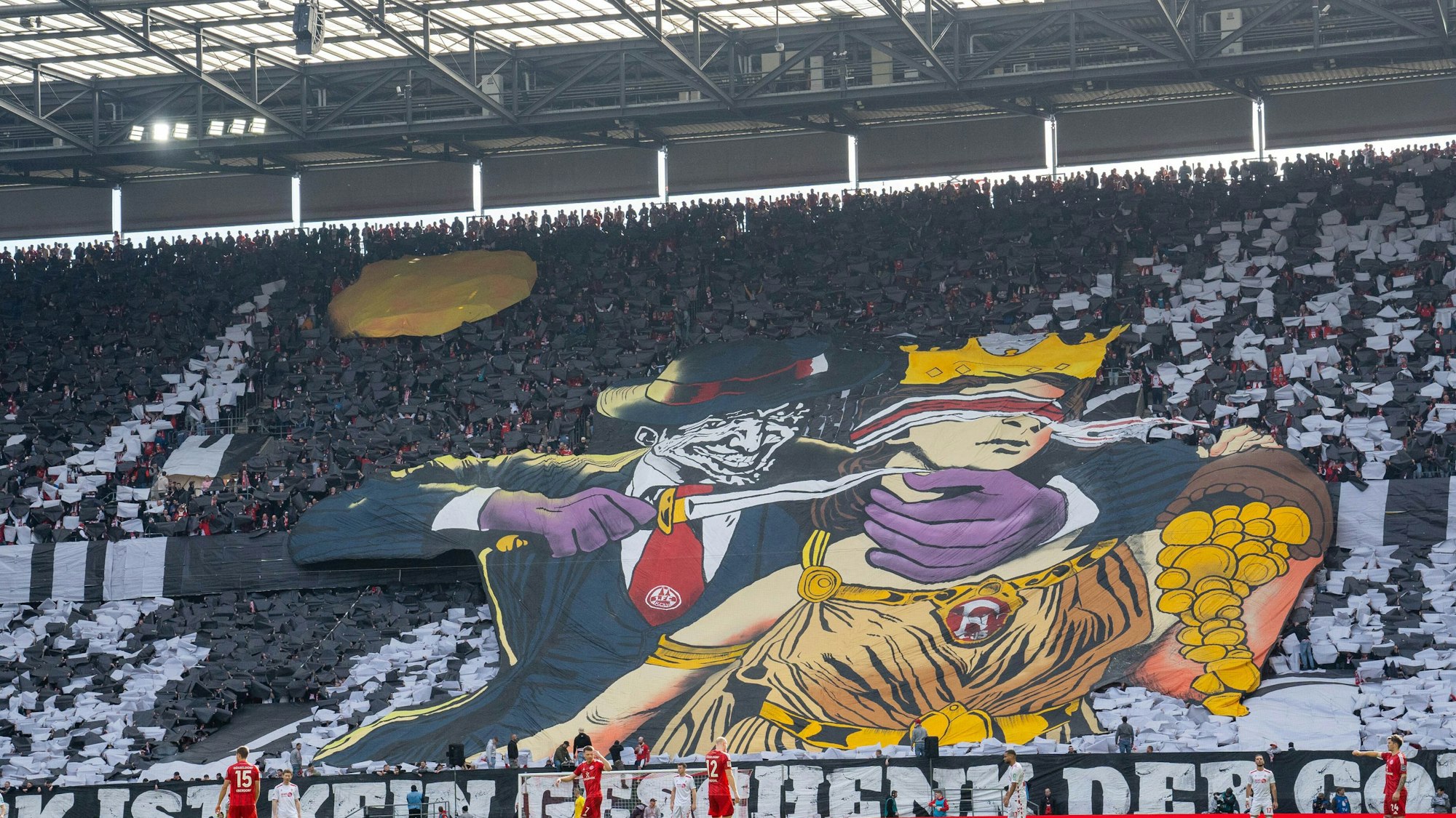 Bei der umstrittenen Choreographie der FC-Ultras wird Glücksgöttin Fortuna ein Messer an den Hals gehalten.