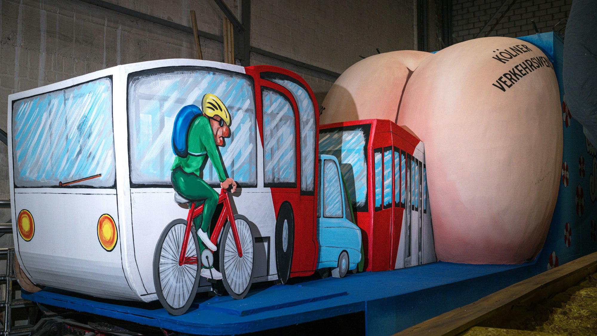 Die Verkehrswende in Köln ist „fürn Arsch“, findet das Kreativteam des Festkomitees.