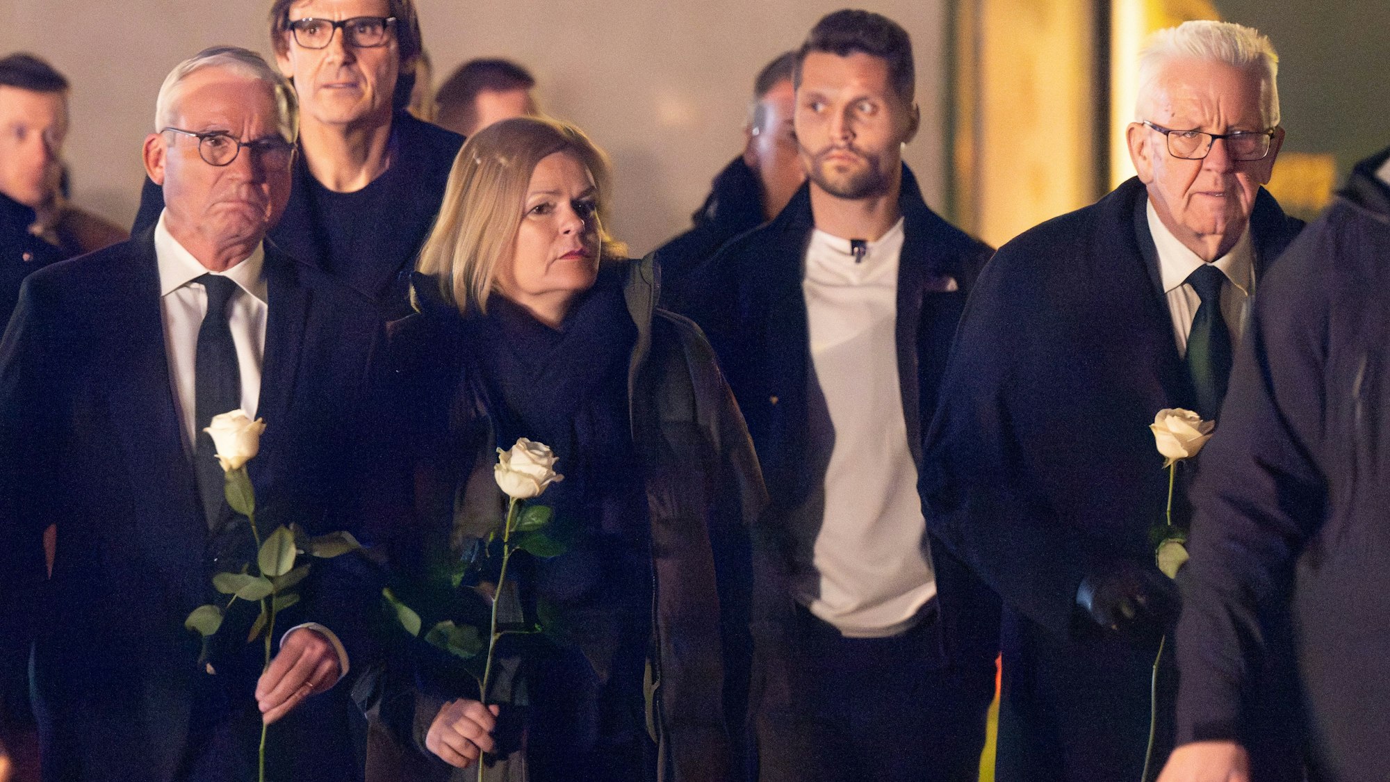 Winfried Kretschmann (r.), Ministerpräsident von Baden-Württemberg, Nancy Faeser (SPD), Bundesinnenministerin, und Thomas Strobl (CDU), Innenminister von Baden-Württemberg, kommen zum Paradeplatz in Mannheim.