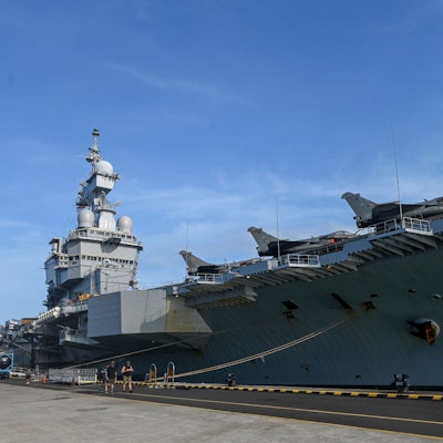 French Rafale Marine fighter jets are seen on the flight deck of the French aircraft carrier Charles de Gaulle during a media tour at Changi Naval Base in Singapore on March 4, 2025. (Photo by Roslan RAHMAN / AFP)