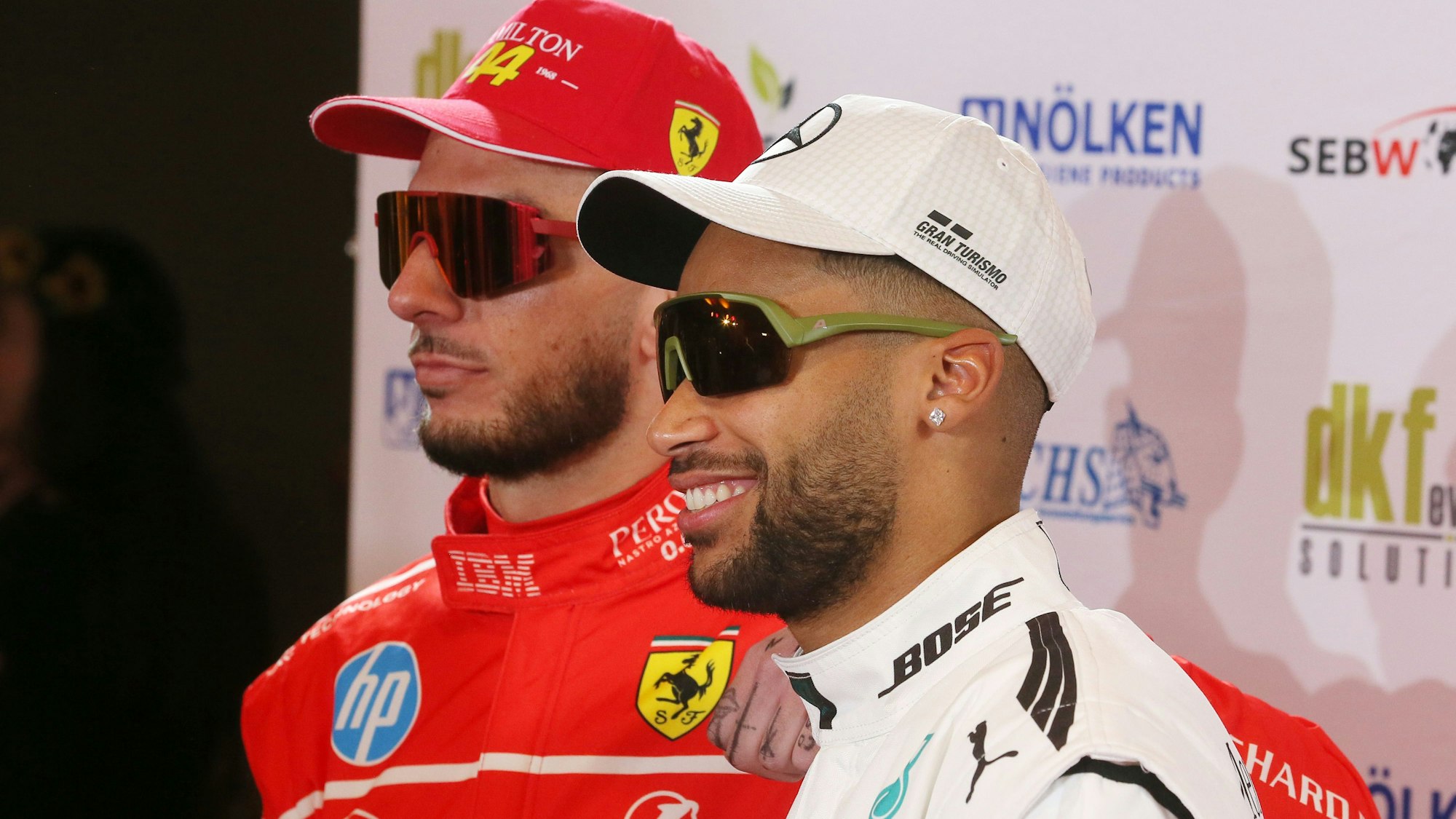 1.FC Köln, Karnevalssitzung, von links: Leart Pacarada, Linton Maina (1. FC Köln), 25.02.2025 Bild: Herbert Bucco