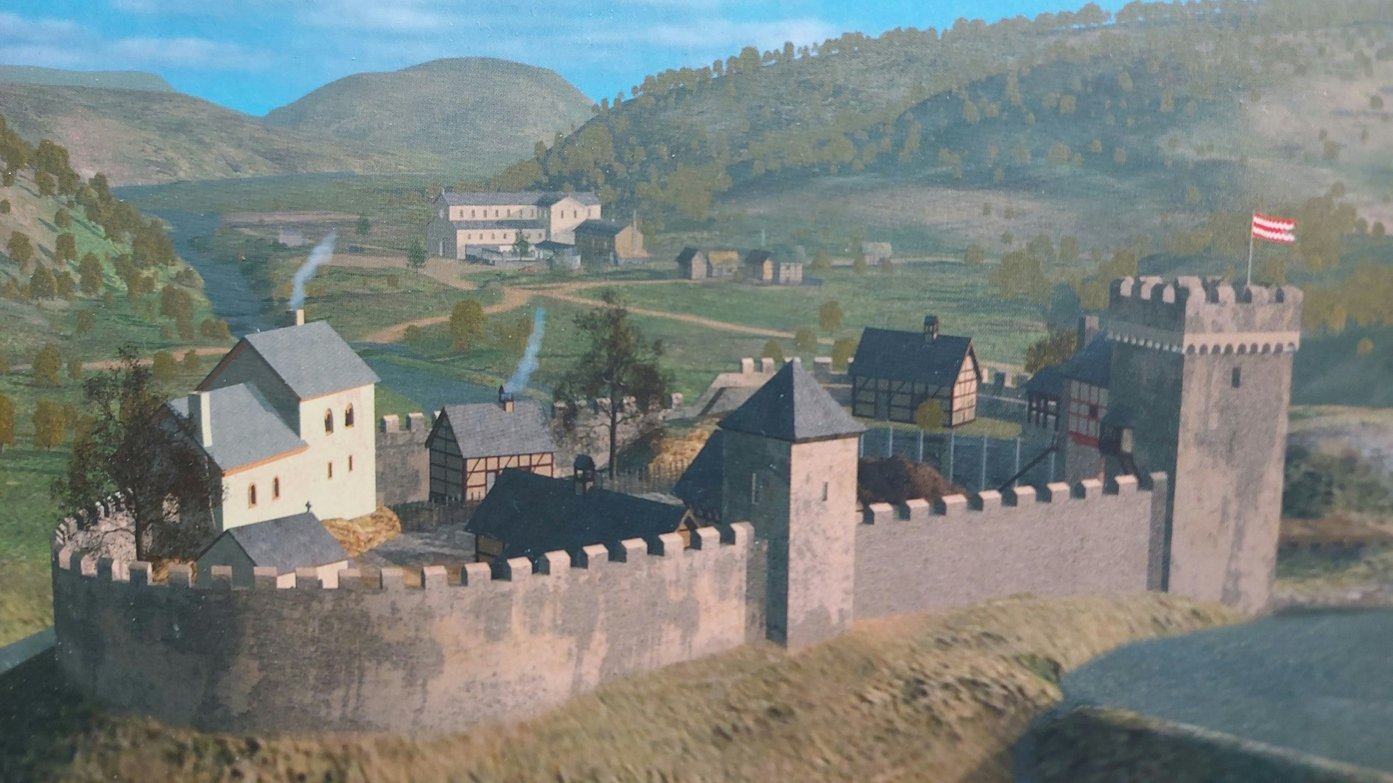 Eine Burg mit Festungsmauer.