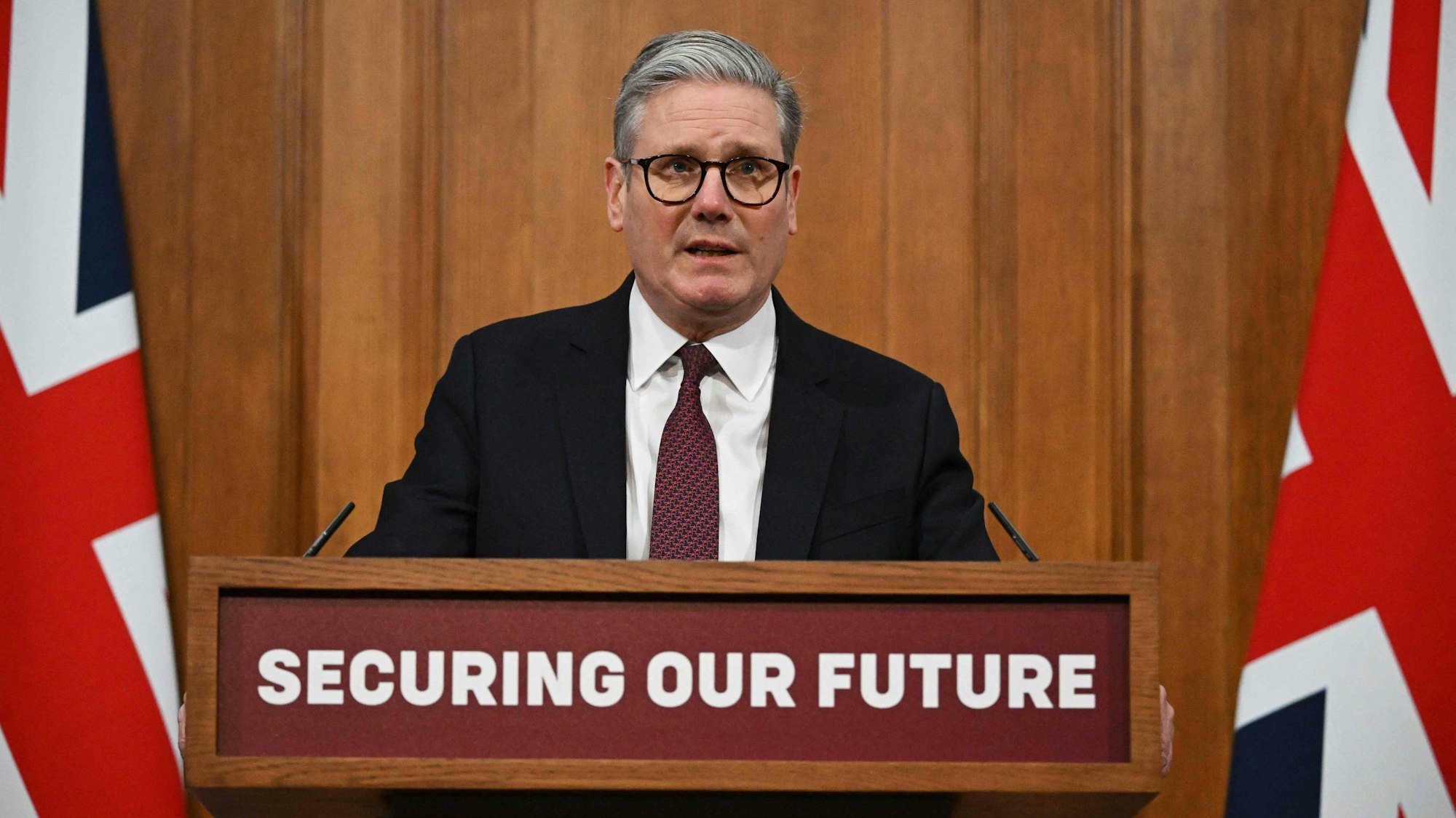 Britain's Prime Minister Keir Starmer holds a press conference in the Downing Street Briefing Room after hosting virtual meeting with international leaders to discuss support for Ukraine, in central London on March 15, 2025. (Photo by Leon Neal / POOL / AFP)