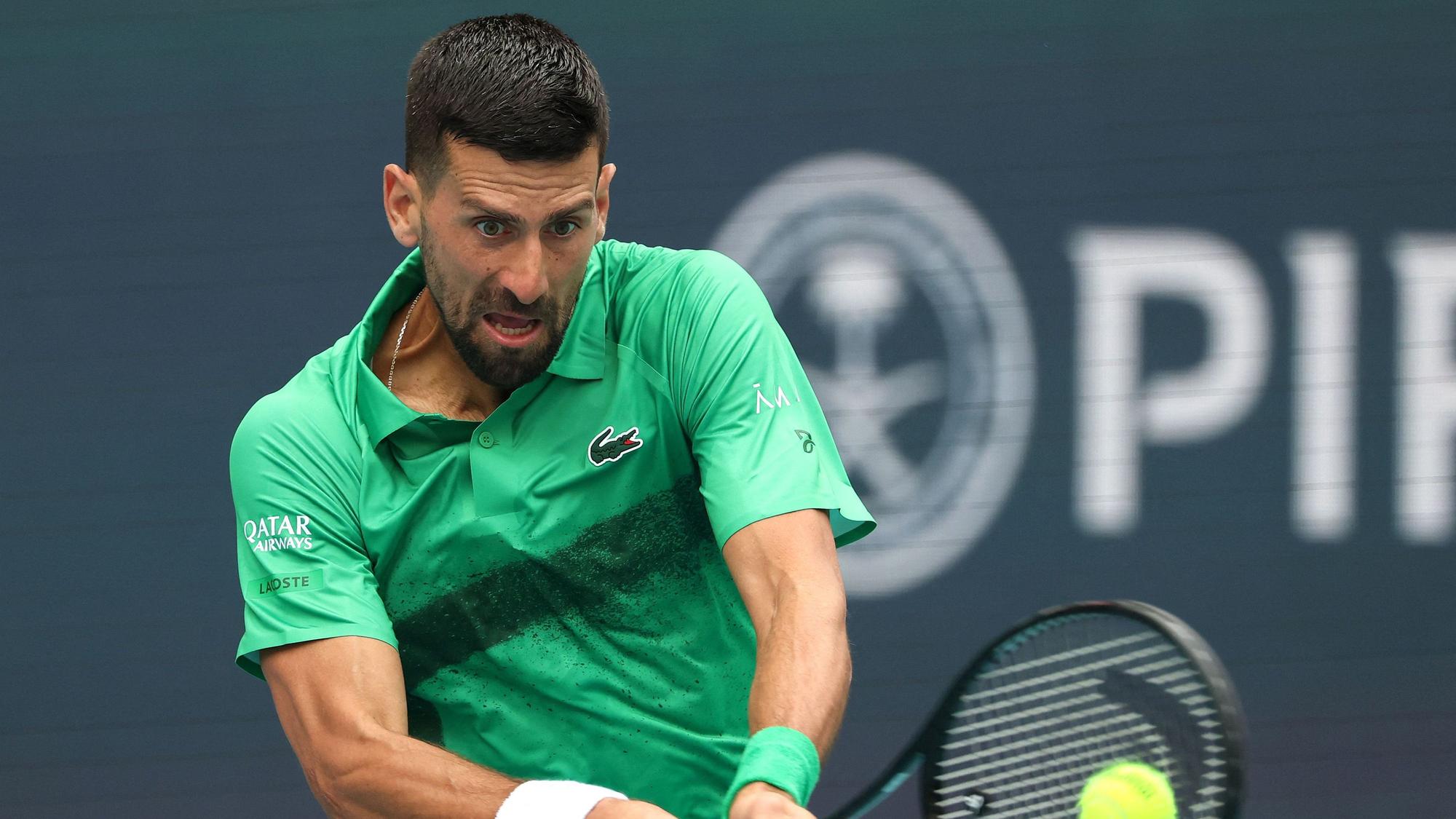 MIAMI GARDENS, FLORIDA - MARCH 23: Novak Djokovic of Serbia returns a shot against Camilo Ugo Carabelli of Argentina during Day 6 of the Miami Open at Hard Rock Stadium on March 23, 2025 in Miami Gardens, Florida. Al Bello/Getty Images/AFP (Photo by AL BELLO / GETTY IMAGES NORTH AMERICA / Getty Images via AFP)