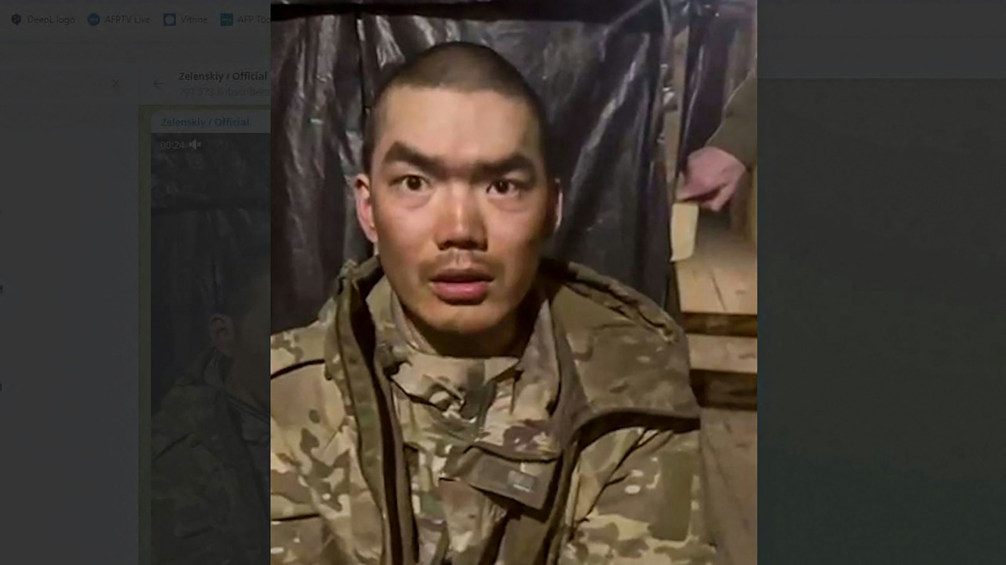 TOPSHOT - This handout video grab published on the official Telegram channel of Ukrainian President Volodymyr Zelensky on April 8, 2025 shows, according to the Ukrainian president, one of  two Chinese soldiers he said were captured by Ukrainian forces in the Donetsk region. Ukrainian President Volodymyr Zelensky said on April 8, 2025 that Ukrainian troops had captured two Chinese citizens fighting alongside Russian forces, adding that Kyiv would demand an explanation from Beijing and a reaction from its allies. (Photo by Handout / Telegram / @Volodymyr Zelensky / AFP) / RESTRICTED TO EDITORIAL USE - MANDATORY CREDIT "AFP PHOTO / Official Telegram channel of Ukrainian President Volodymyr Zelensky" - NO MARKETING NO ADVERTISING CAMPAIGNS - DISTRIBUTED AS A SERVICE TO CLIENTS - AFP CANNOT INDEPENDENTLY VERIFY THE AUTHENTICITY OR LOCATION, DATE, AND CONTENT OF THESE IMAGES. /