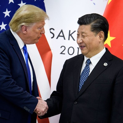 (FILES) This file photo taken on June 28, 2019 shows China's President Xi Jinping (R) shaking hands with US President Donald Trump before a bilateral meeting on the sidelines of the G20 Summit in Osaka. With his storm of tariffs on Chinese goods, US President Donald Trump on April 2025 has torched ties with Beijing and likely wrecked any hope of meeting his counterpart Xi Jinping in the near term, analysts say. (Photo by Brendan Smialowski / AFP) / To go with AFP story China-US-diplomacy-politics-trade-economy,ANALYSIS by Matthew Walsh