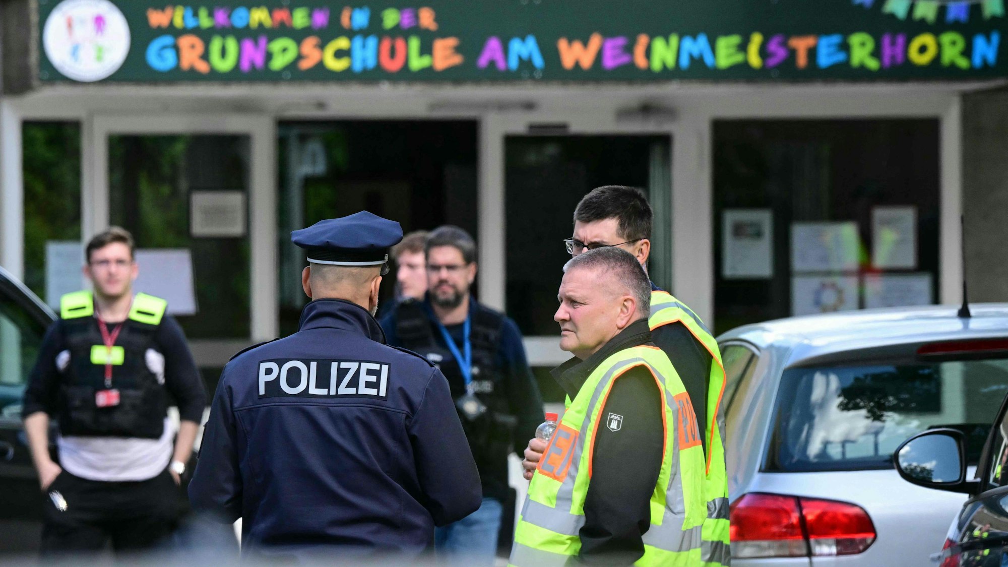 Police work at the scene where a stabbing was reported at an elementary school in Berlin's Spandau district on May 22, 2025 (Photo by Tobias SCHWARZ / AFP)