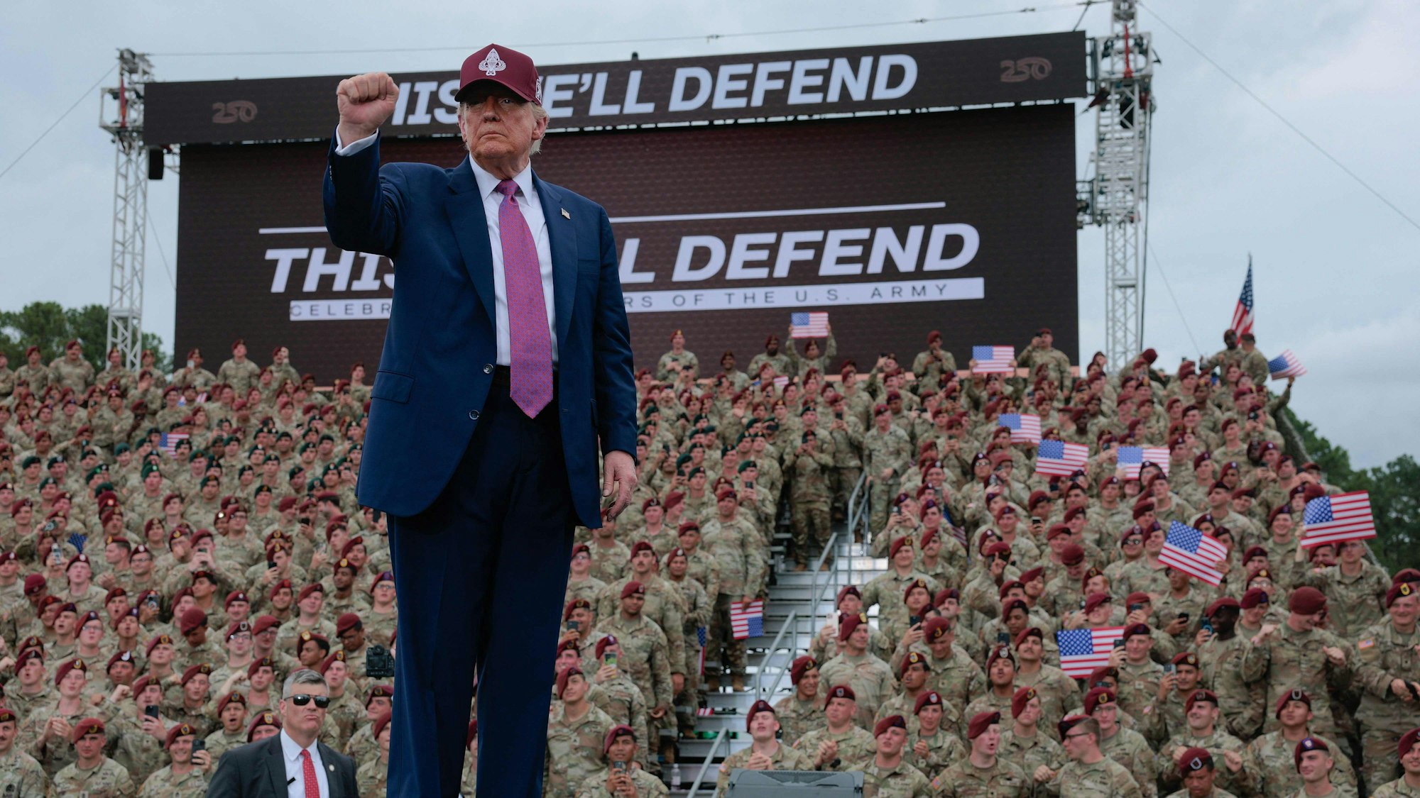 FORT BRAGG, NORTH CAROLINA - JUNE 10: U.S. President Donald Trump pumps his fist as he leaves the stage during a rally with U.S. Army troops on June 10, 2025 at Fort Bragg, North Carolina. Trump is traveling to Fort Bragg Army base to observe a military demonstration and give remarks in honor of the U.S. Armys 250th anniversary. Anna Moneymaker/Getty Images/AFP (Photo by Anna Moneymaker / GETTY IMAGES NORTH AMERICA / Getty Images via AFP)