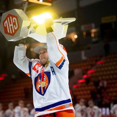 230218 Tapparas Valtteri Kemiläinen celebrates with the trophy after winning the