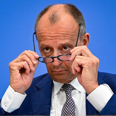 German Chancellor Friedrich Merz adjusts his glasses while addressing a press conference on home and foreign policy in Berlin on July 18, 2025. (Photo by Tobias SCHWARZ / AFP)