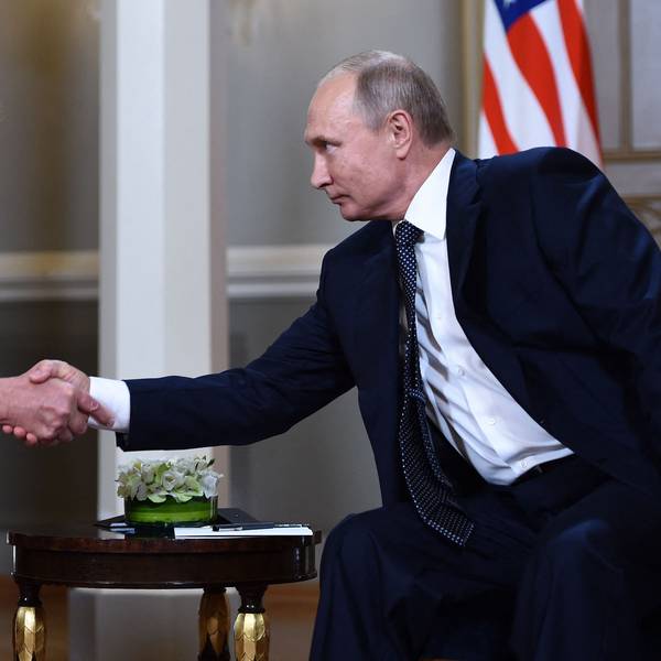 (FILES) Russian President Vladimir Putin (R) and US President Donald Trump shake hands before a meeting in Helsinki on July 16, 2018. US President Donald Trump said on August 8, 2025 he would meet with Russian counterpart Vladimir Putin on August 15 in Alaska, as the Republican billionaire hopes to help mediate an end to the war in Ukraine. (Photo by Brendan Smialowski / AFP)