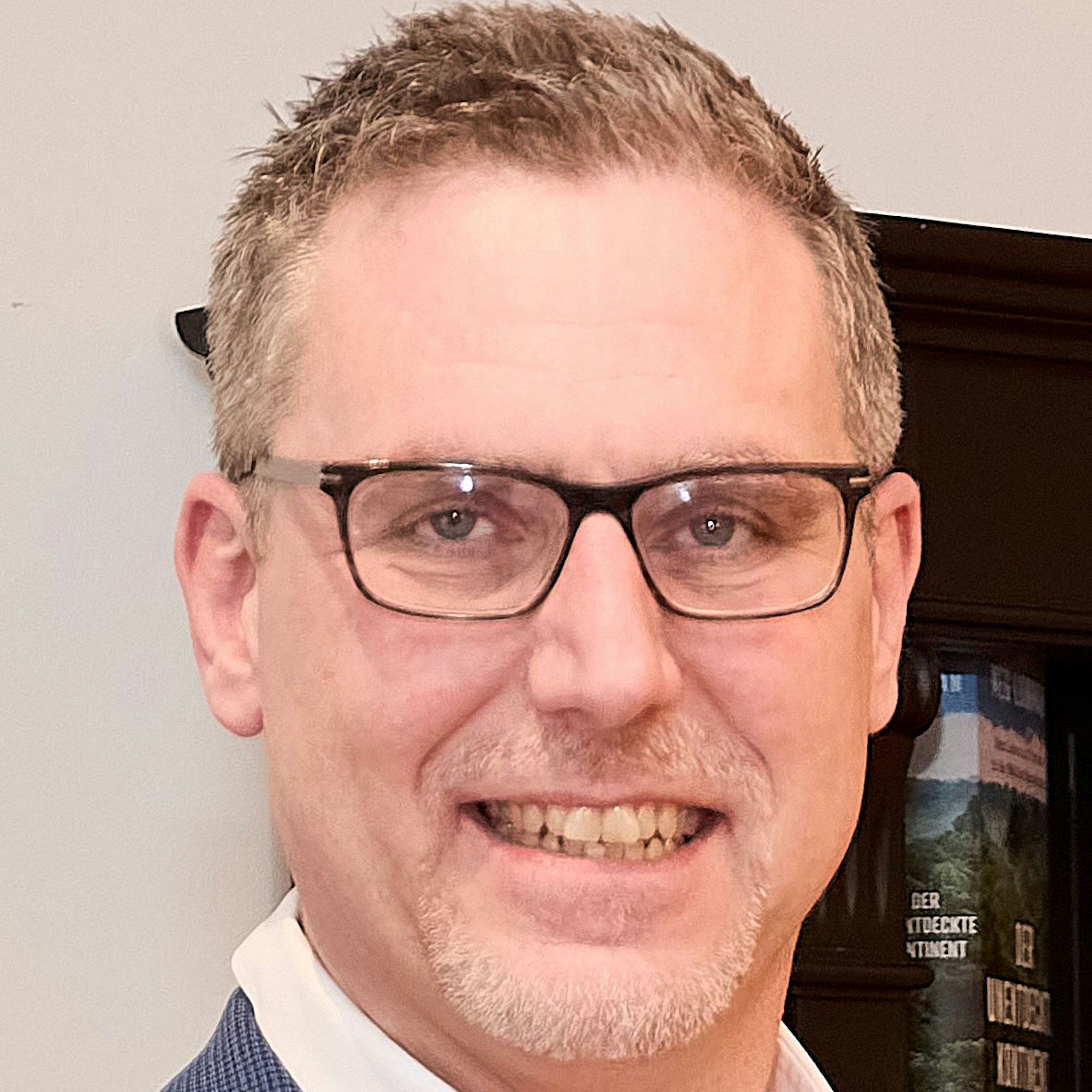 Das Porträtbild zeigt Norbert Crump.