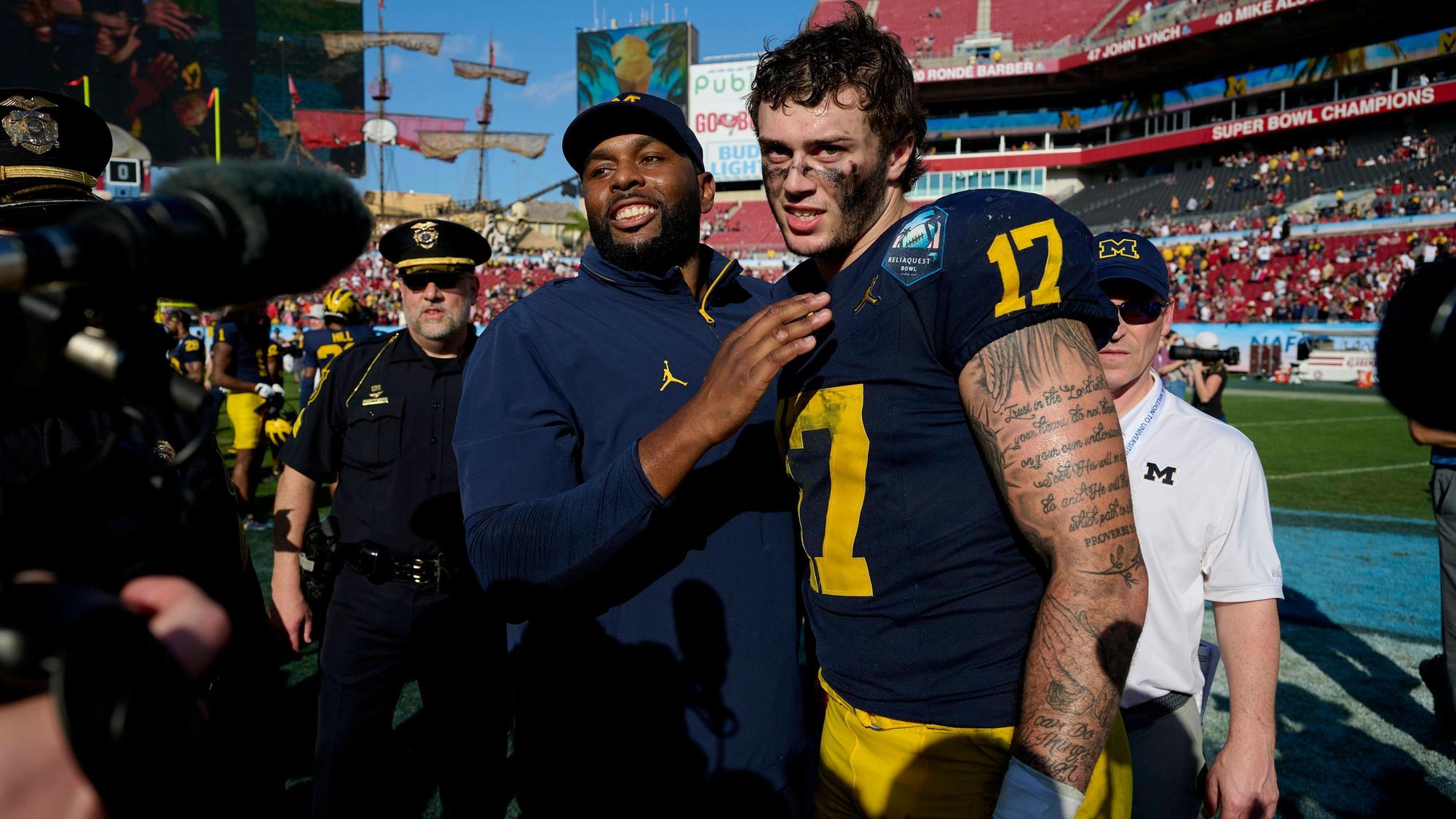 December 31, 2024: Michigan head coach Sherrone Moore celebrates with tight end Marlin Klein 17 after an NCAA, College League, USA football game between the Michigan Wolverines and Alabama Crimson Tide at Raymond James Stadium in Tampa, Florida. /CSM Tampa United States - ZUMAc04_ 20241231_faf_c04_221 Copyright: xMikexJanesx