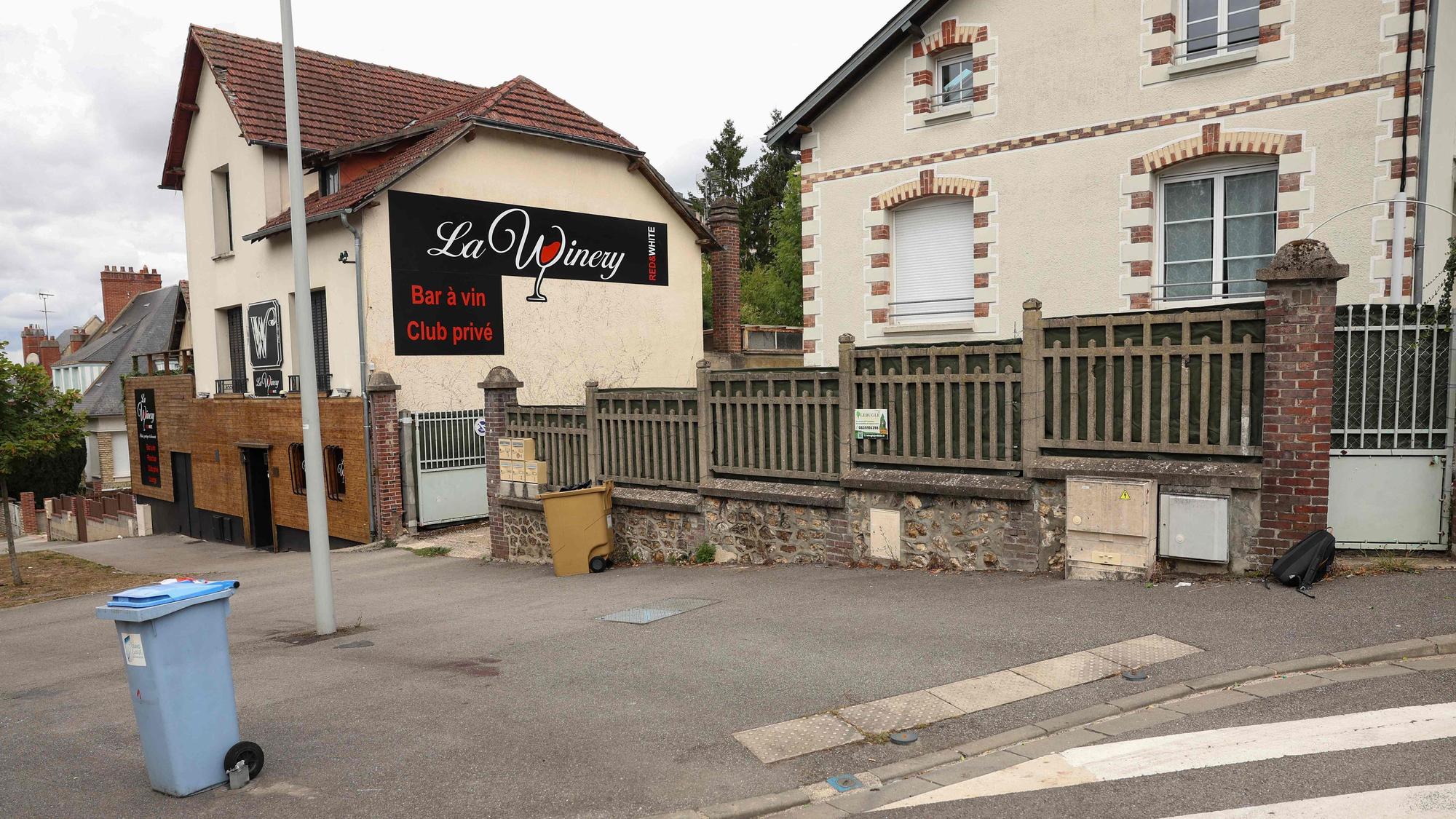 This photograph taken on August 30, 2025, shows blood stains on the road outside the bar 'La Winery', the site of a deadly car ramming in the northwestern French town of Evreux in Normandy. A man intentionally ploughed his car into a crowd outside a wine bar in Evreux after an altercation in the early hours of August 30, 2025, killing one person and injuring five others, two of them critically, prosecutors told AFP. (Photo by Xavier GALIANA / AFP)