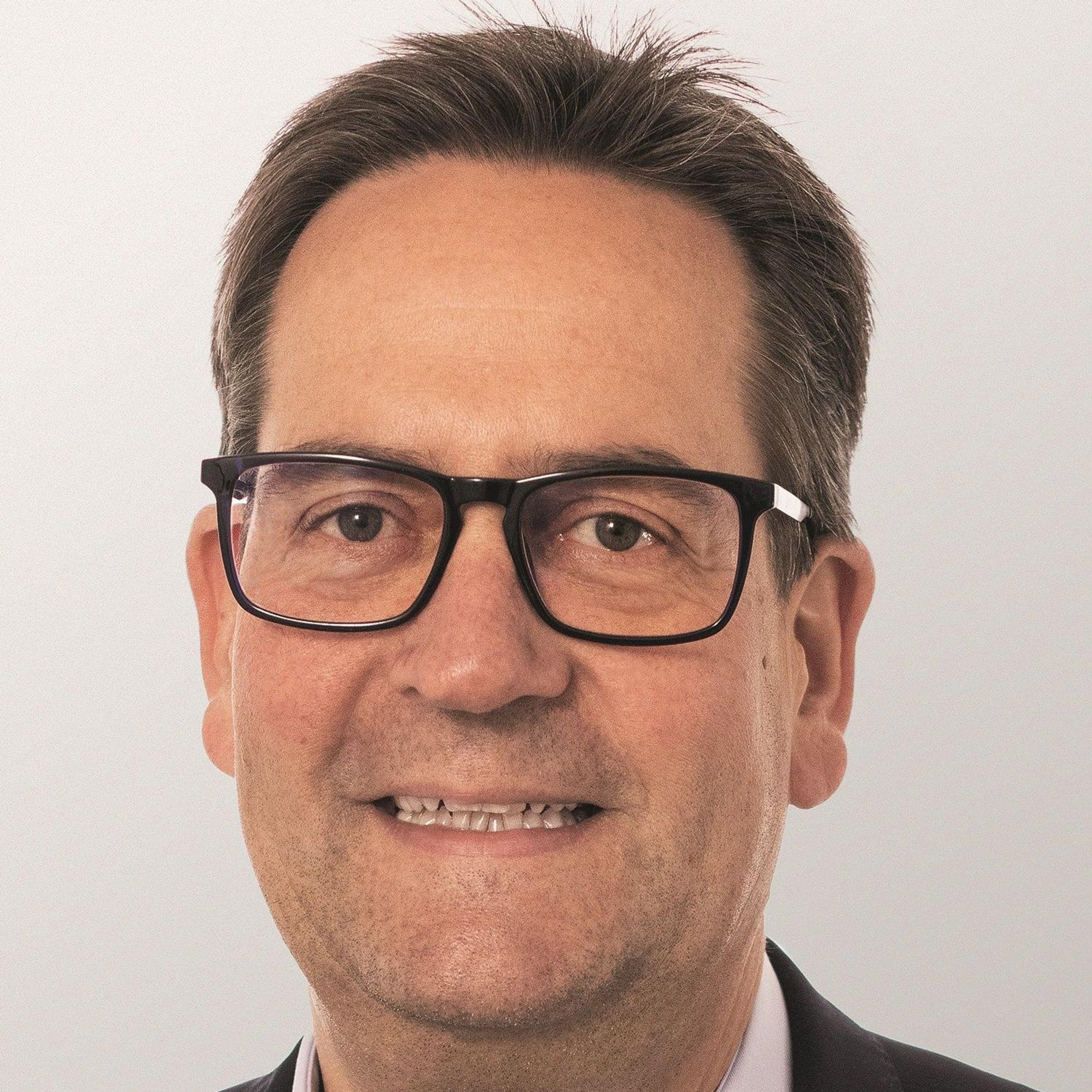 Porträtbild von Markus Herbrand.