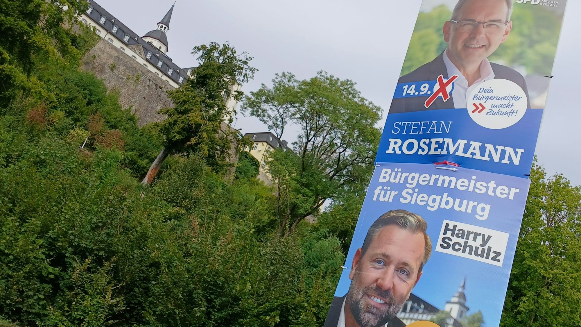 Stefan Rosemann (SPD) und Harry Schulz (CDU) gehen am 28. September in die Stichwahl um das Siegburger Bürgermeisteramt, Wahlplakate