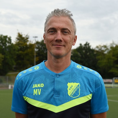 Marcus Voike lächelt in die Kamera.