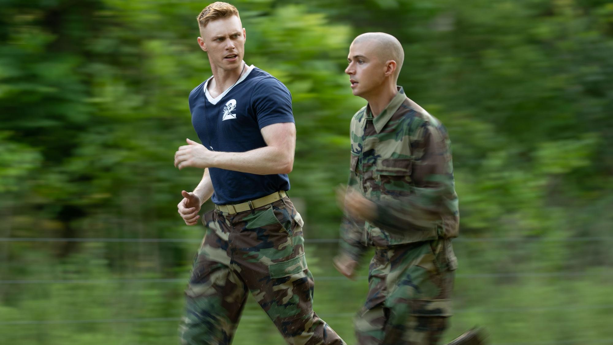 BOOTS. (L to R) Max Parker as Sgt. Sullivan and Miles Heizer as Cameron Cope in Episode 103 of Boots. Cr. Alfonso "Pompo" Bresciani/Netflix © 2023