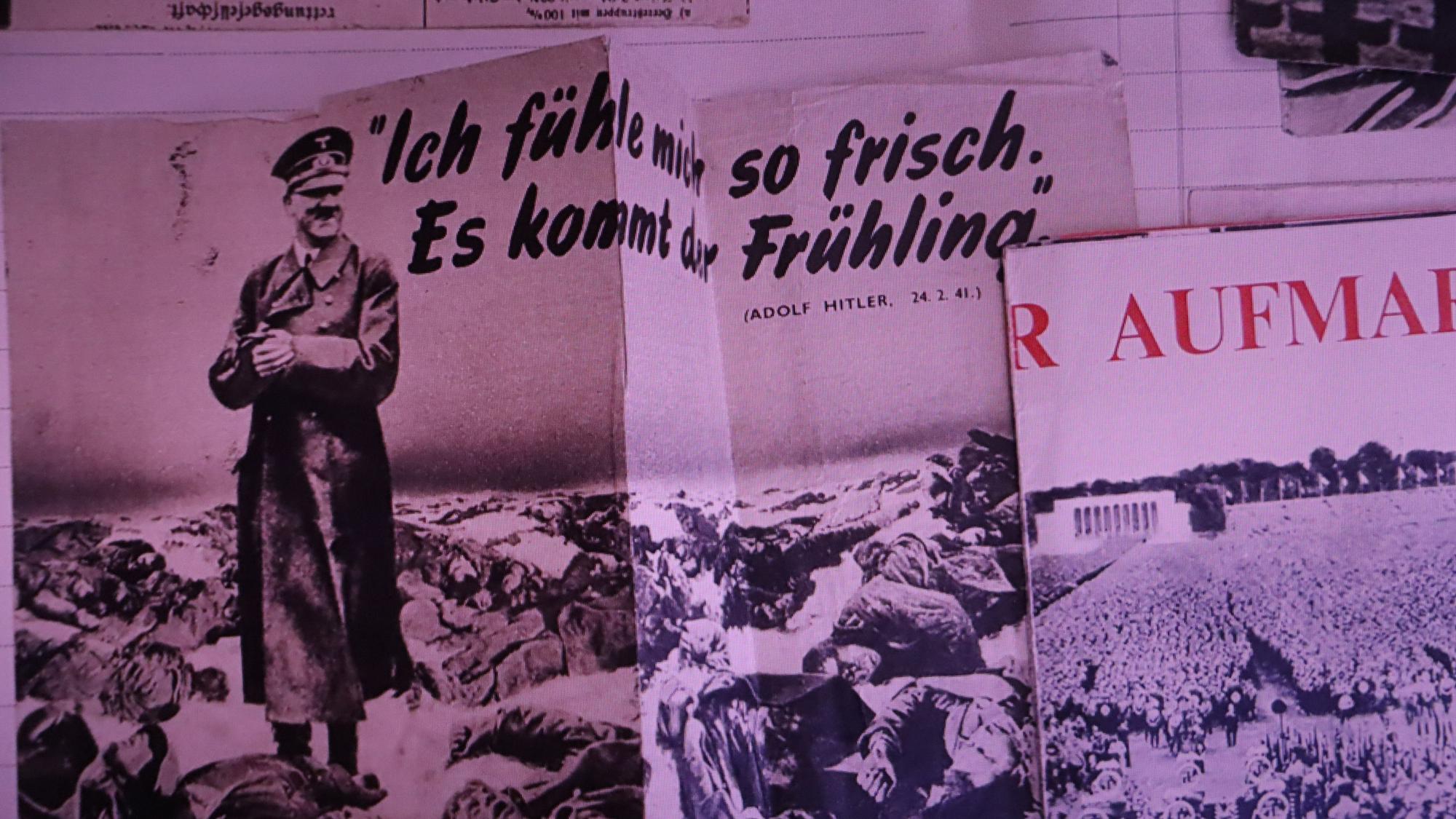 Hitler lächelt umringt von Leichen - Motiv auf einem britischen Flugblatt.