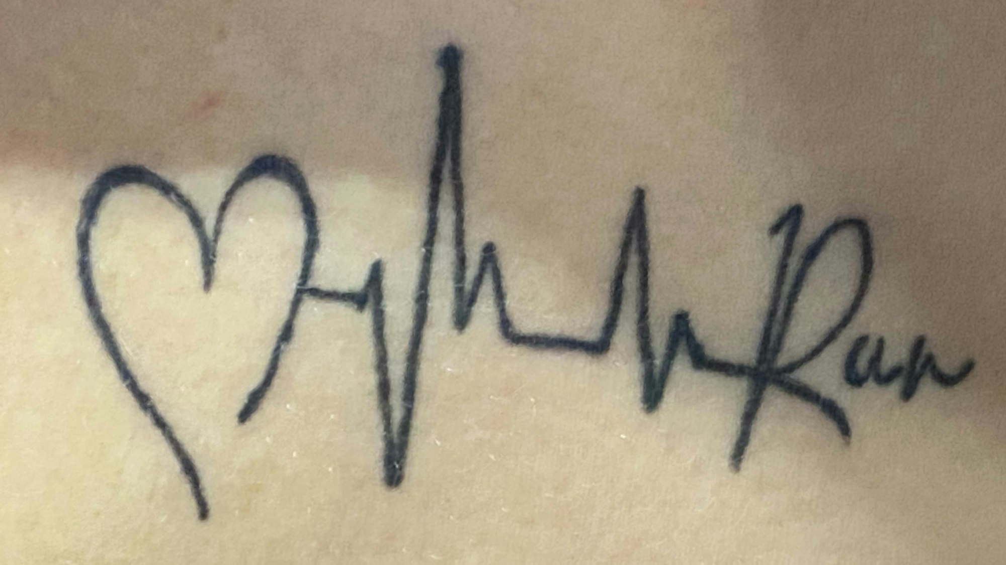 Ein Herz, die Frequenz des Herzschlags und das Wort ‚Run‘.