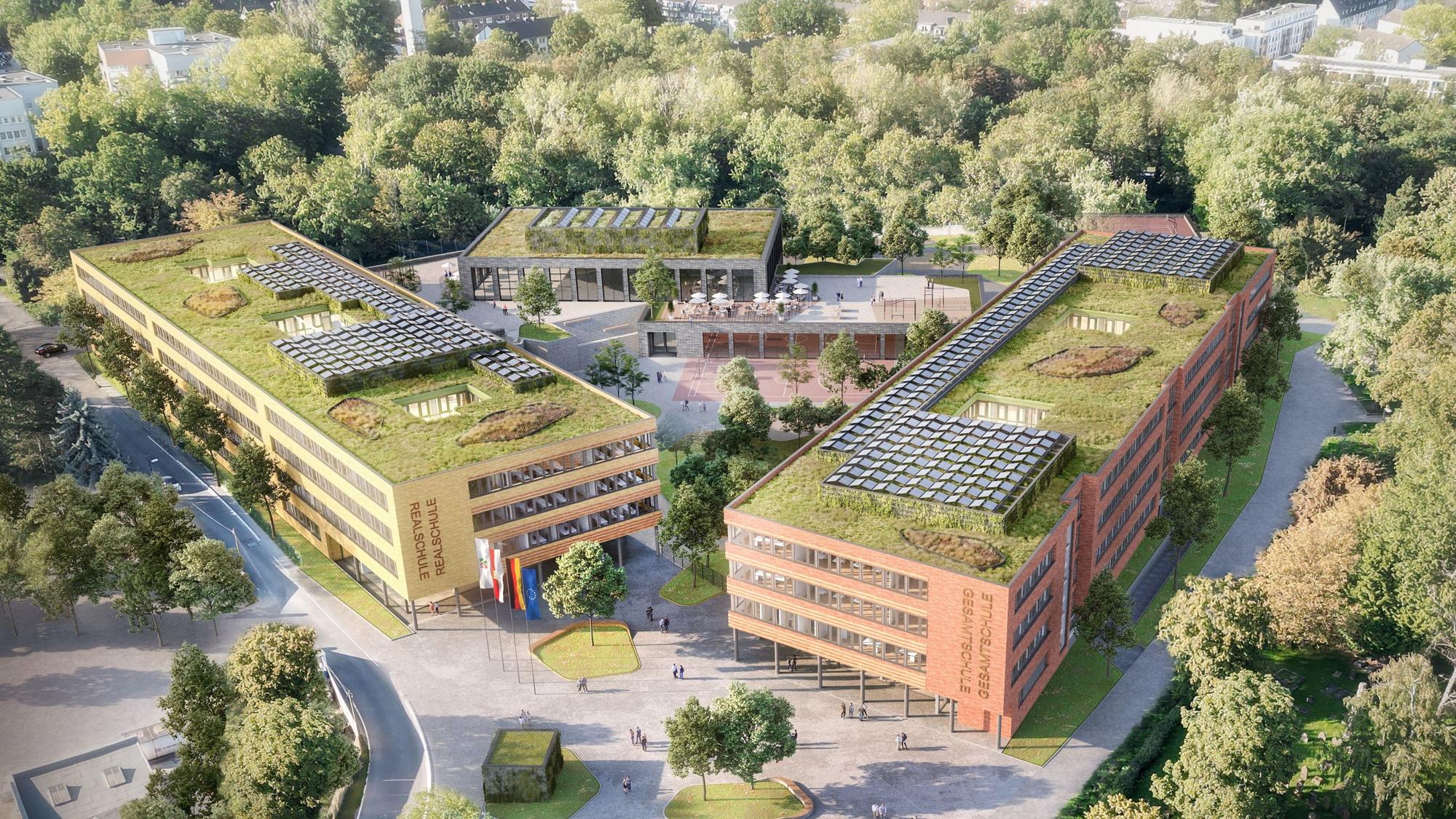Aufsicht auf zwei Schulgebäude.